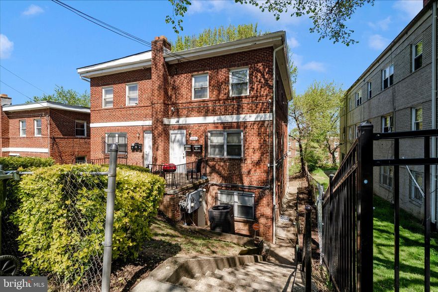 STABILIZED DUPLEX WITH ADMINISTRATIVE & PHYSICAL UPSIDE. Positioned for the savvy owner-occupant or investor, this semi-detached duplex offers a rare combination of significant size and immediate cash flow. The Upper Unit: Spanning two levels, this expansive 5-Bedroom/2-Bathroom unit is currently occupied and generating $2,377/month in guaranteed income through the Housing Choice Voucher Program. There is immediate room to request a rent increase through the "Rent Reasonableness" process to align the 5-bedroom footprint with current sub-market benchmarks, providing a clear path to increased gross rent without additional capital expenditure.

THE LOWER UNIT: Recently updated and currently vacant, the lower-level 2-Bedroom unit features a fresh, neutral palette, a modern kitchen with white cabinetry, and new carpet. This unit is perfectly suited for an owner-occupant looking to house-hack or for an investor to place a new tenant at current market rates. Strategic Advantage: With one unit already stabilized and the other offering a "blank canvas," this property minimizes acquisition risk while offering two distinct paths to value-add appreciation.