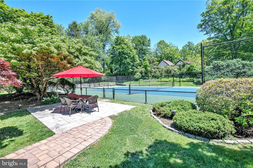 Mid-Century Modern Contemporary. Windows & Views Describes this Best! Pristine, Turn-key Cul-de-Sac property on a most coveted tree-lined street, premiere location. Down a private driveway awaits this handsome custom built home on a beautiful manicured lot, tranquil vistas and Tennis Courts! Modern throughout 3 finished levels, every room opens to wrap-around Terraces on every level, including the fully finished Lower Level walks out to glorious views. This Luxury home offers incomparable open concept layout affording a seamless flow designed for family and large scale entertaining indoors and outdoors. Features large center Foyer with heated floors and striking floating staircase; Living Room with custom fitted Wet-Bar, Fireplace, wall-to-wall Glass Doors and Transoms to capture natural light and the commanding views as you step out onto the wrap-around Terraces. The Dining Room flows to the lavish Kitchen with luxurious heated floors, high tech designed with Commercial grade appliances Thermador, Bosch, Subzero, 6-Burner contemporary Gas Viking Range, Warming Drawer, Pot-Filler and chic Lighted Wine Rack. Soft-close custom Cabinetry organizes the Pantry, Stemware, Kitchenware, Cutlery, the oversized Island, is designed for interactive seating, sharing with family & friends for meal preparation, the prep-station and Coffee Bar provide perfect spaces for all your culinary and entertaining needs. Light-filled Breakfast Room continues out to the Glass-Canopied Terrace, built-in outdoor Kitchen with views to inspire decadent culinary faire! Library/Office has custom cabinetry, wall to wall custom glass doors steps out to Terraces, Dual custom-fitted Coat closets, a formal Marble Powder Room, Main floor Laundry and Mudroom complete the first floor. The custom Floating Staircase invites upstairs with spectacular views, the Master Suite is separated to the west-end of the home replete with Sitting Area, Dual-Sided Fireplace, built-in book shelves and opens out to the serene vistas on the private Master Terrace. Luxurious heated Bath floors, His and Her dual fitted Vanities, Cabinetry, Fireplace and Jacuzzi overlook the serene private views from the glass wall of windows. Huge walk-in Closet with Skylight is fitted to organize all your haberdashery. Roman Steam Sauna Shower relaxes and soothes and looks out to private stunning views. East-end accommodates contemporary Jack & Jill Bedrooms dual vanities, Walk-in Shower, built-in cabinetry, large closets and each with private Terraces. Luxury Guest Suite and Bath with Skylight has Sitting area, large closet and overlooks the Tennis Courts.