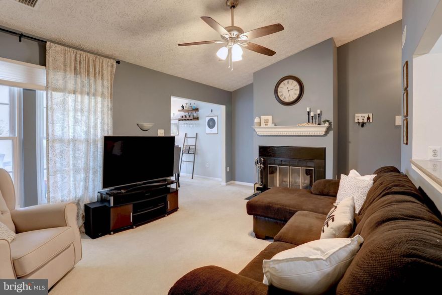 Stunning Penthouse Condo with Modern Upgrades and Scenic Views. Welcome to luxury living in Arnold! This immaculate penthouse condo offers a blend of sophistication and comfort, with a prime location close to Anne Arundel Community College, a short walk to the golf course and the bustling Bay Hills Shopping Center. Upon entering you will be greeted by the airy ambiance enhanced by cathedral ceilings and abundant natural light. The spacious living area features a cozy wood burning fireplace, perfect for a relaxing evening or entertaining guests. The updated lighting adds a touch of elegance and functionality, while cordless blinds provide convenience and privacy. A charming balcony offers a peaceful retreat to enjoy your morning coffee or unwind after a busy day. The dining area boasts a convenient bump-out, providing ample space for hosting dinners and gatherings. With two bedrooms and a beautiful bathroom this condo offers both comfort and style. The primary bedroom is a serene oasis with two closets, ensuring plenty of storage space, while neutral colors throughout create a calming atmosphere. Additional features include a newer HVAC system for year-round comfort and convenience. Whether you're a busy professional, a small family, or an investor seeking an attractive rental property, this penthouse condo offers an unparalleled lifestyle opportunity in Arnold. Don't miss out on the chance to make this exquisite condo your own. Schedule a showing today and experience the epitome of modern living in Arnold.