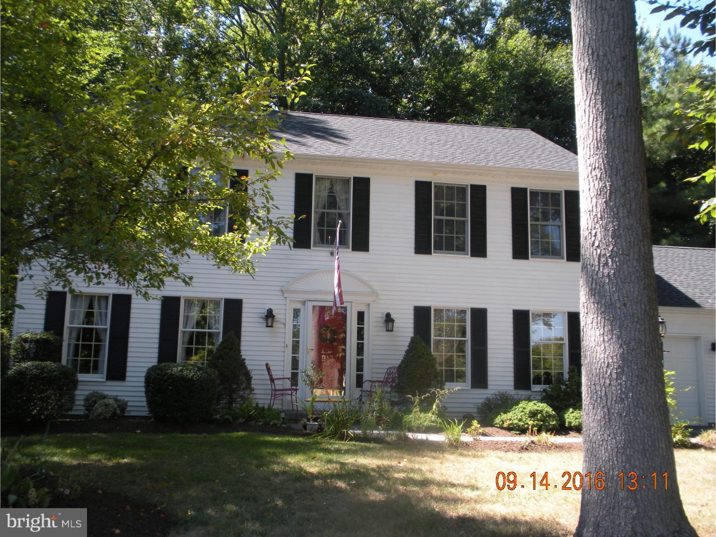 Lovingly maintained and loved by the original owner this home is nestled in a sylvan setting and surrounded by open space.  The home is filled with light and the many windows take advantage of the views. The three season room - the owners have entertained there even in December - opens to the deck and the quiet back yard.  The home has a gracious feel and an open floor plan. The cooks kitchen features updated and upgraded appliances and a convenient first floor laundry.  The basement has a finished room which can be a perfect playroom, home office or can meet many other needs.  Four spacious bedrooms and a two car garage are more of the many other features in this fine home.