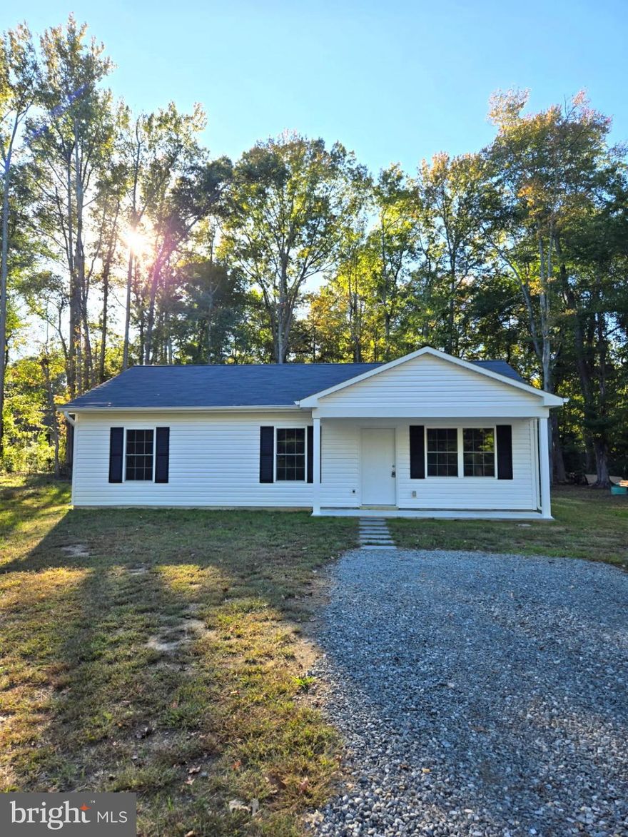 Beautiful, move-in ready, brand-new construction located in a quiet neighborhood right next to the river, making for a magnificent starter home at such a fantastic price!!! Come home after a long day and unwind with everything this wonderful residence has to offer. Whether you're cooking up a delicious meal in the kitchen on the ample granite countertops and stainless-steel appliances, kicking back in the family room to watch a fun TV show and/or movie, or even taking a well-deserved nap in one of the spacious bedrooms, there is no shortage of features to love. The new build just makes everything feel so fresh!!! Not to mention, the large, flat yard space is perfect for entertaining friends & family as well as all manner of outdoor activities no matter what the occasion. Plus, you're not more than a short walk from the water nearby or a short drive from Colonial Beach, Westmoreland State Park, and even the quaint little town of Montross. With all of this and more, come on down and stop by!