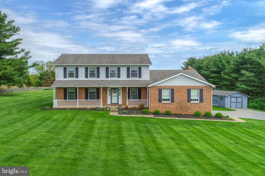 PRICED TO SELL: This spacious home on almost 1.5 acres of private land, and convenient to highway! This solid home is truly a gem, starting with the living room which boasts a wall of built in bookshelves, You'll also find crown molding and chair rails throughout much of the downstairs. The family room, which is open to the eat in kitchen, shows off a brick wood burning, fireplace.  The dining room, kitchen and family room all have sliding glass doors which lead to the enormous Trex deck off the back is the entire length of the house and gives views to the very secluded level yard. Upstairs the master bath includes a jetted tub and shower, which is part of the spacious master bed.  Three other carpeted beds and a  full bath round out the space on the upstairs level. The basement is clean and unfinished but full of potential.  2-car garage and separate shed give more than enough space for storage. Set up an appt today to view your forever home!