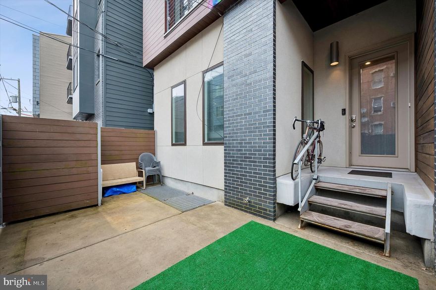 Welcome to this beautiful bi-level home with a large private yard.  The home is actually on Ogden street, a small, quiet street.  The unit seamlessly blends modern style, comfort, space and convenience, all in a prime location. 

Enter through the private gate that opens to your extra large front yard with plenty of space for relaxing, entertaining, gardening and more.  This private fully fenced space also offers options for bike storage and more, a unique quality for city living.
Entering the unit, you will first notice the soaring 11-foot ceilings and abundance of natural light - making the space feel grand and welcoming.
The open floor plan features a spacious living room, large kitchen and dining area. The hardwood floors throughout are a great design feature and tie the space together perfectly.
The sleek kitchen showcases warm tone wood cabinetry, stainless steel appliances, subway tile backsplash and quartz counters. The island provides additional space and bar stool seating.  The pantry is another added bonus to this home that provides great storage options throughout.
 
Next to the kitchen is the dining area that can serve multiple purposes, currently set up as a reading area.

The lower level features the bedroom, bathroom and a large storage closet that wraps around under the stairs.
The spacious bedroom offers a generous retreat with a double door walk-in closet and large windows. 
The oversized bathroom has a walk-in shower with glass doors and vanity. The unit has a laundry area that makes life easier every day (located in the walk in closet).

The low condo fees include water, sewer, trash, snow removal, exterior building maintenance, etc. aiding in stress free living.

The home has unique qualities you will love including the large private patio, spacious layout, storage space and modern design, all in a convenient location. You don’t want to miss this opportunity!
The home is conveniently near famous restaurants, cafes, and local shops to explore.  Experience the one of a kind charm of this home and neighborhood.