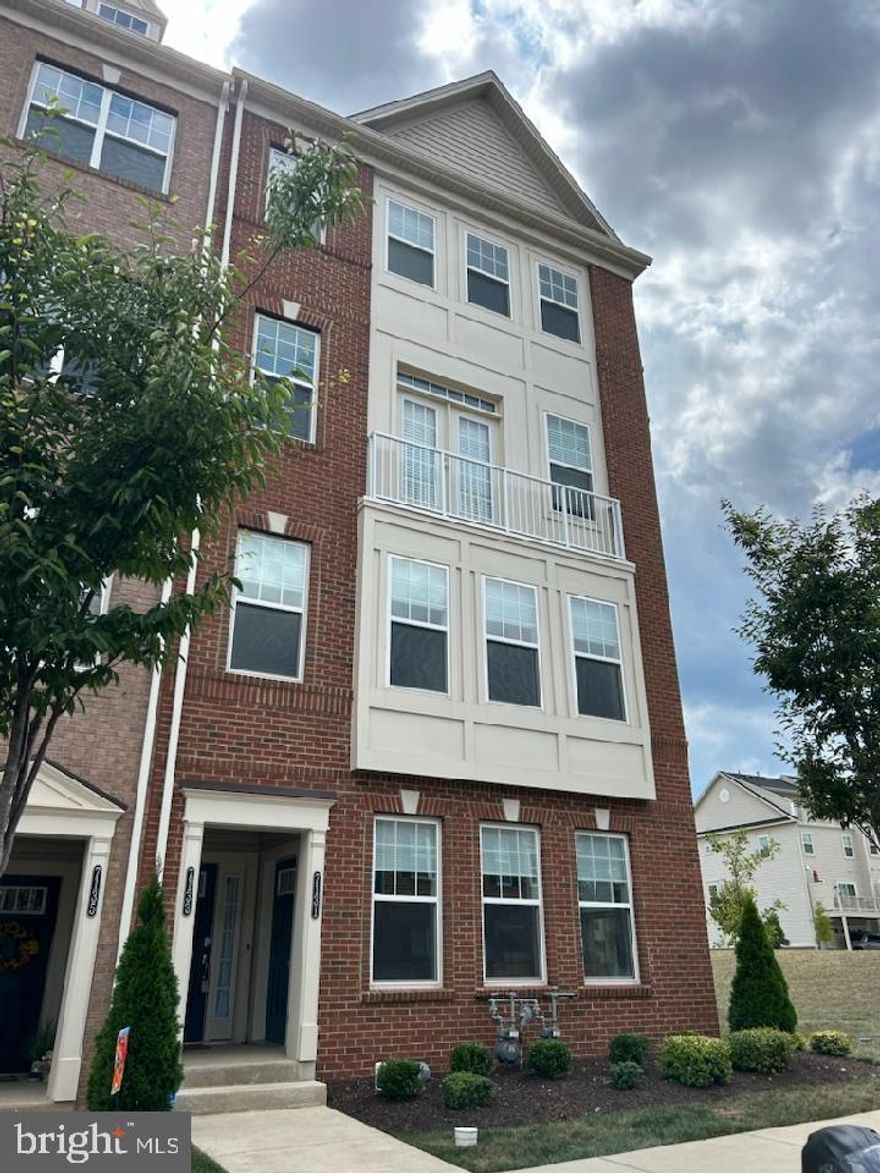 Amazing TOP floor with Elevator access to all 3 floors. This home is 2 yrs old and still has builder warranty that will pass to new owner. Open floor plan with breakfast area leading to deck. Large eat at counter for 6 with gas cooking , stainless appliances , granite countertops, lots of cabinets. Large living room off the kitchen for the open concept and great for entertaining. Office off living room for the stay at home workers. Laundry located on the upper level , yes the W/D does convey. 1 car garage with plenty of off street parking. Enjoy the community pool & club house. Location is great for the commuter with easy access to 270/ 70 / 15. Plus it's close to everything Westview has to offer, movies , dinning and more.