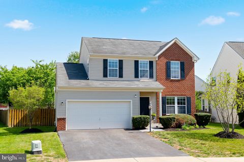 Photo of 13596 Dodsworth Drive, BRISTOW, VA 20136 (MLS # VAPW2119800)