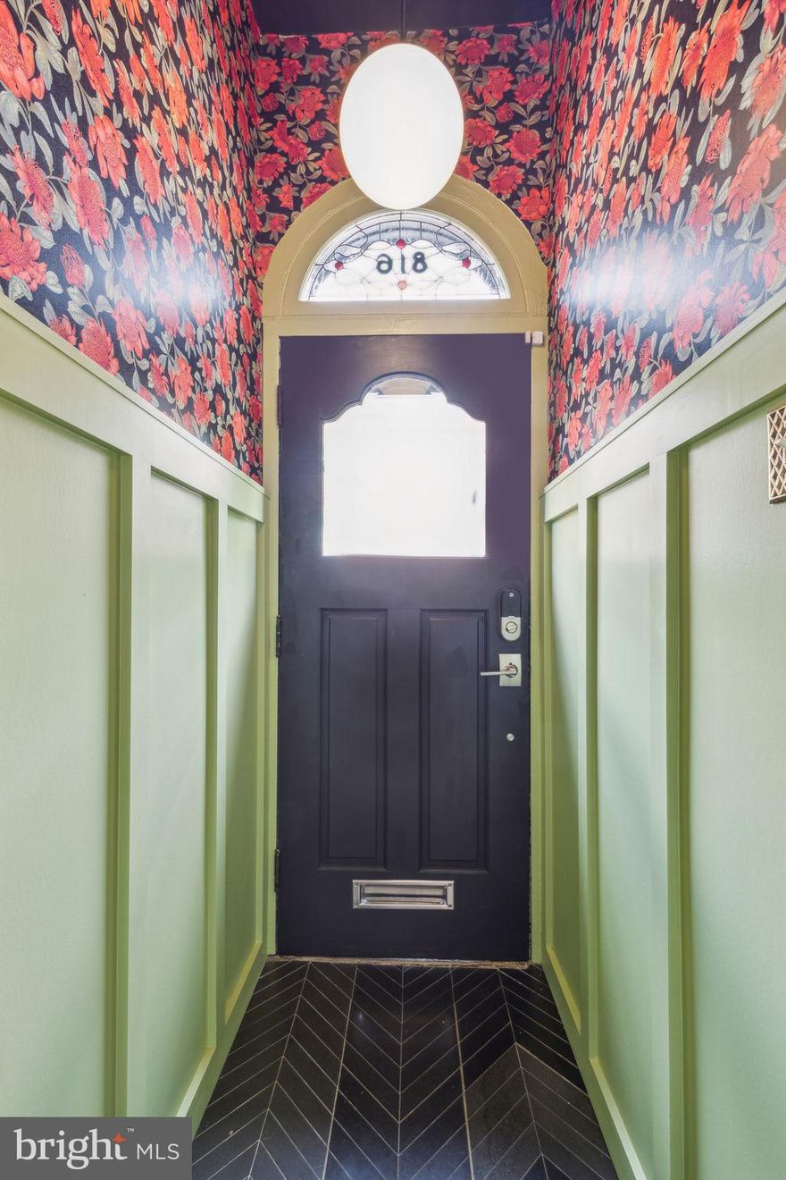 ***Sunday, 4/20 7pm offer deadline***Nestled on a tree-lined block in East Passyunk, 816 Dickinson Street is a lovingly updated and well maintained 3-bedroom, 1.5-bathroom home that masterfully blends classic charm with modern updates. The charming home greets you with a traditional brick façade and a welcoming vestibule adorned with wainscotting, herringbone tile, wallpaper, and a handmade stained-glass transom. Inside, the expansive first floor boasts 9-foot ceilings, large windows, and original inlaid hardwood floors, creating a warm and inviting atmosphere.
The heart of the home is the recently renovated, custom-designed eat-in kitchen. It features ceiling height cabinets, quartzite countertops, GE Café appliances, a vent hood, an expansive island with butcher block countertops, hexagon-tiled floors, floating shelves, and designer lighting—perfect for both everyday living and entertaining. Adjacent to the kitchen, the patio offers a tranquil outdoor space ideal for relaxing, grilling, or growing an urban garden. A convenient, wallpapered powder room with a pocket door completes the first floor.
Upstairs, you'll find three generously sized bedrooms and a full bathroom. The first bedroom comfortably accommodates a queen-sized bed. The second bedroom with tasteful beadboard makes the perfect nursery, home office or guest room.  Just down the hall, the primary bedroom features a custom wall-to-wall closet system and is large enough for a king-sized bed. The tastefully tiled, updated hall bathroom includes a tub-shower combination, heated floors, and a linen closet.  Make your way to the unfinished lower level where you’ll find the laundry area, a tankless water heater and an abundance of storage space.
Located in the heart of vibrant East Passyunk, this home is surrounded by neighborhood favorites such as Termini Bros Bakery, El Chingon, Milk Jawn, Cosmi’s Deli, Benna’s Café, Barcelona Wine Bar, and so much more. With its blend of historic charm, modern amenities, and walkability 816 Dickinson Street is a must-see!