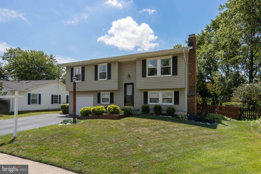 Sought after Four Seasons Estates!  Do not miss this TURN KEY home!   Featuring 4 bedrooms & 2 recently remodeled/upgraded  full baths .    Wonderfully updated eat-in  kitchen with granite, back splash & ceramic tile flooring!   Spacious living room with  wood floors complete the main level.    Lower level offering  a family room with fireplace, 4th bedroom/office/den, 2nd full renovated bathroom , laundry/mudroom off of garage and walk out to the amazing rear yard!   Enjoy your summer evenings on the spacious deck or private patio!   This one will not last!   Call today for your private preview.