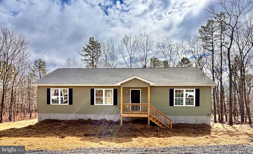 BRAND NEW CONSTRUCTION AND COMPLETED! This brand new house for sale by local builder Scott and Scott Construction is an incredible find that you won't want to miss out on! With 1,500 square feet of space on the main floor and an unfinished basement, you get a total of 3,000 square feet to customize and make your own. What's more, it's situated on a flat half-acre lot, adding to the appeal of this property.

As you step through the front door, you'll be immediately impressed by the open floor plan, which is accentuated by durable luxury vinyl plank flooring and vaulted ceilings. The heart of the home is the spacious kitchen, which will feature gray cabinets, granite countertops,  an oversized island and sleek black appliances for all your cooking needs.

The owner's suite, located on the left side of the house, has double closets and an en suite bathroom complete with a double vanity and a walk-in shower. On the right side of the house, you'll find the 2nd and 3rd bedrooms, which share a hall bathroom.

When you step out onto the back deck, you'll be greeted by a view of the partially wooded backyard, perfect for outdoor activities and relaxation.

The home tour concludes in the unfinished basement, providing you with endless possibilities to customize the space to suit your future needs. Whether you dream of creating additional living space, a home gym, a game room, or anything else, this blank canvas is ready for your creative touch.

All paved roads until Quail! Come and enjoy nature while only being 20 minutes to Winchester or Strasburg shopping and restaurants. HOA includes road maintenance, snow removal, pond and park.

This new build offers the perfect combination of modern design, quality construction, and the potential for customization. Don't let this opportunity slip away – schedule a viewing today and make this house your new home!