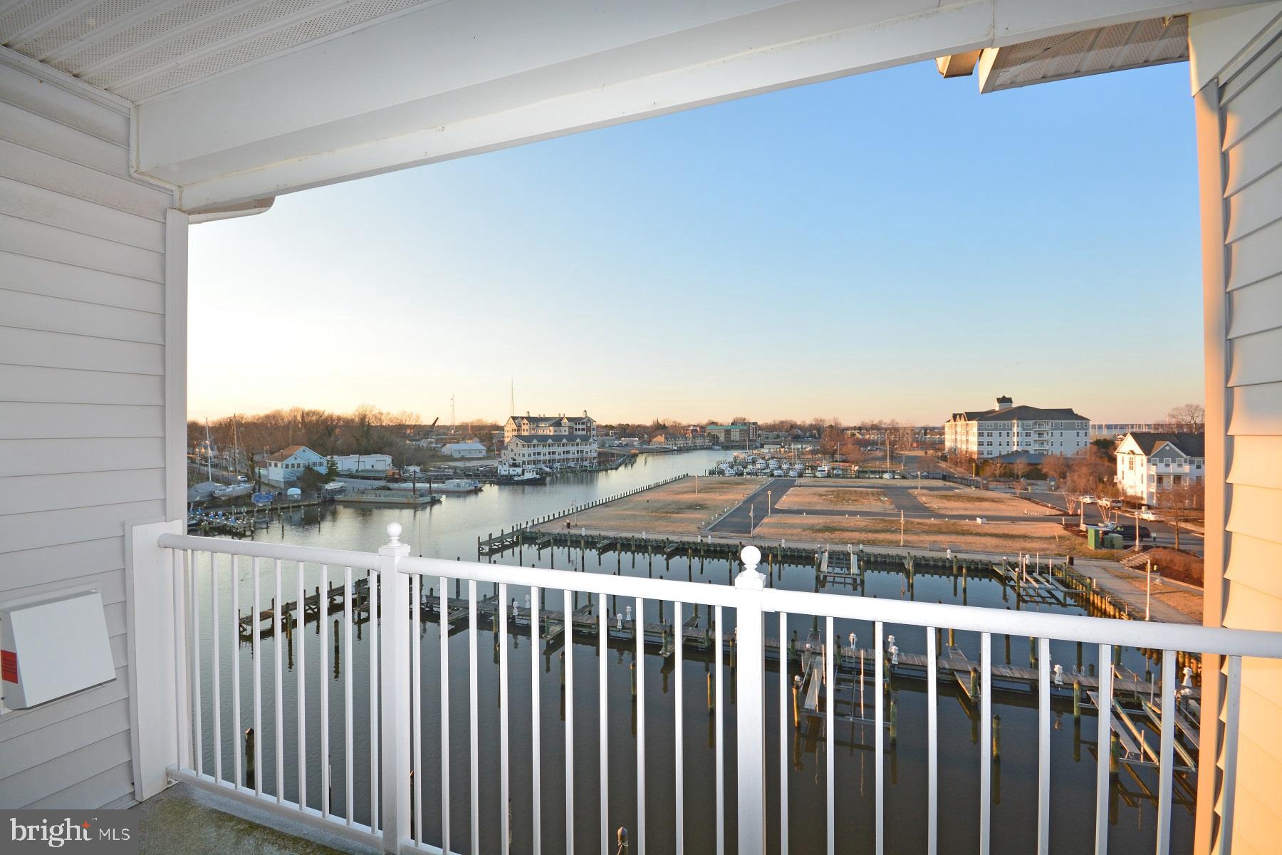 Desirable 4th floor waterfront unit overlooking Cambridge Creek! Ideal for full time or second home. Dorchester model featuring open floor plan, great views from waterfront balcony, master bedroom suite with master bath & walk in closet. Separate living & dining room, laundry room. Assigned parking spot in garage. Community amenities include pool, riverwalk and marina. Close to downtown and easy access to Route 50.