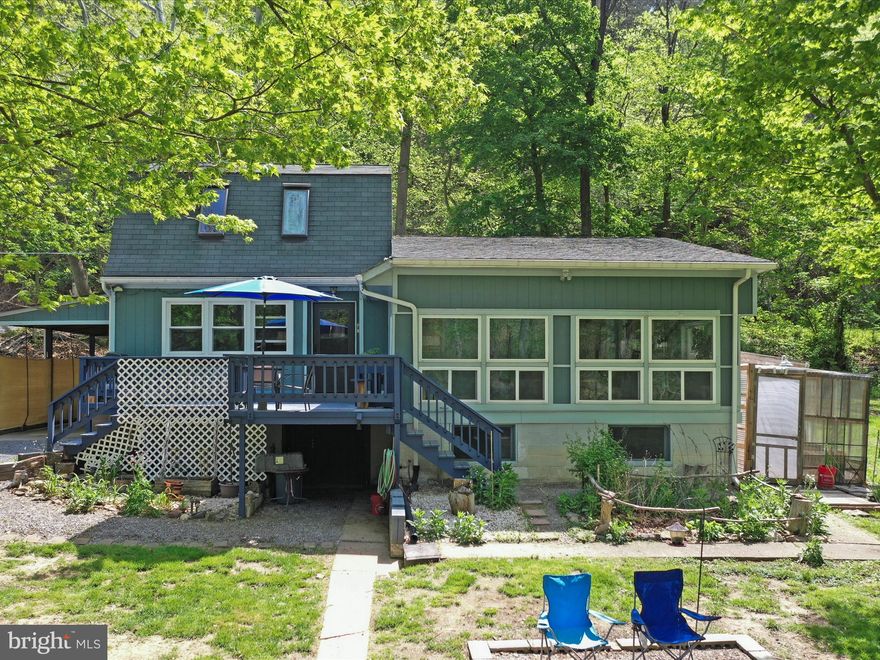 Summer is here (or coming real soon).  Your Cacapon River waterfront home is waiting for you and your outdoor fun!  Drop a kayak in or tube from your backdoor.  The name on the private road entering this property says it all...Peaceful Place!  It is just that.  Come find your piece of heaven minutes from Berkeley Springs, WV.  This home would make a great short term rental, second home, or full time river house.  Unrestricted and not part of any community makes this even better.    Home has been upgraded and recently painted, new flooring installed.  There is not much that needs to be done with the exception of possibly adding HVAC.   The owner is offering the buyer of this home First Right of Refusal on the purchase of 17 Peaceful Place, also owned by her family, once that home comes on the market to help you create a nice income stream (or income river...no pun intended).