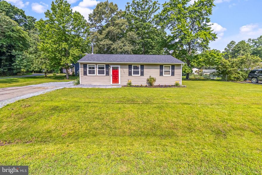 Peaceful Living by the Bay – Perfect for Downsizing!

Looking to simplify without sacrificing charm or location? This move-in ready 3-bedroom, 1-bath rancher is the ideal retreat for anyone craving a slower pace, less maintenance, and more time to enjoy the good life.

Tucked on a quiet corner lot next to a protected nature reserve, this single-level home offers peace, privacy, and natural beauty—with low maintenance. Just a short walk to the bay front, you’ll love starting your mornings with coastal breezes and winding down with sunset walks to the community pier.

Inside, enjoy a warm and inviting open layout, complete with a cozy wood stove and a splash of personality from the bright red front door. Major updates—roof, HVAC, water softener, and well pump—all done within the last 3 years—mean you can move in and relax from day one.

The manageable yard has 2 sheds for extra storage and a roomy driveway (with space for a boat or guests), and surrounding greenery make outdoor living simple and serene. Plus, the neighboring nature reserve means no new development next door—ever.

If you’re ready to downsize to comfort, convenience, and coastal charm, this is the home for you.