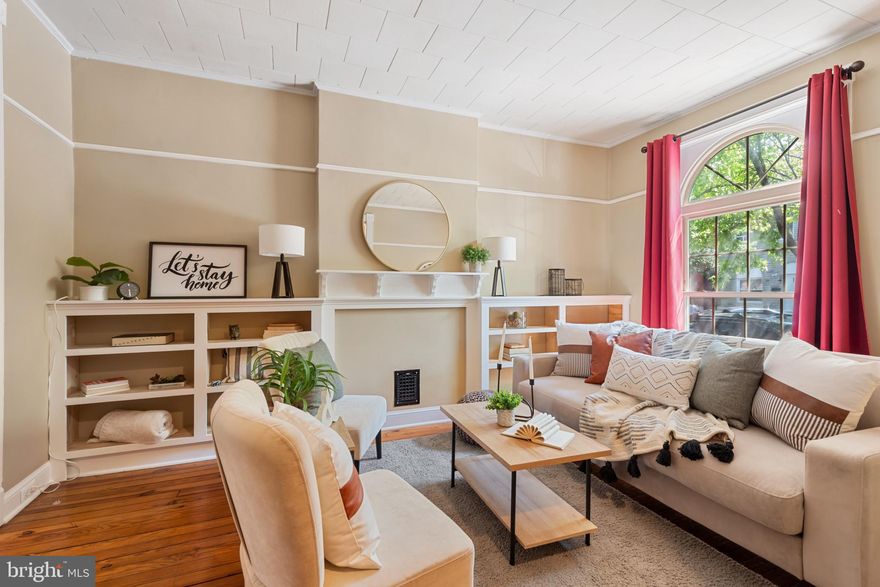 Charming and meticulously maintained home just steps away from Patterson Park, the Canton and Upper Fells Point neighborhoods, as well as the Johns Hopkins Medical Center. Historic features and so much character throughout - glistening hardwood floors, stained glass, exposed brick, high ceilings, with modern updates such as custom built-ins, renovated kitchen with stainless steel appliances and beautiful butcher's block counters, fresh paint, an open floor plan with loads of natural light and tons of storage. Spacious 3 bedrooms above grade with 1 full bathrooms and large basement. Private rear fenced in patio with beautiful garden - great for entertaining, with potential for parking pad. Close proximity to retail shopping, local dining, public park and pool, local library, multiple schools, and all major highways. Schedule a private tour today of this gem in one of the friendliest historic neighborhoods in the city.