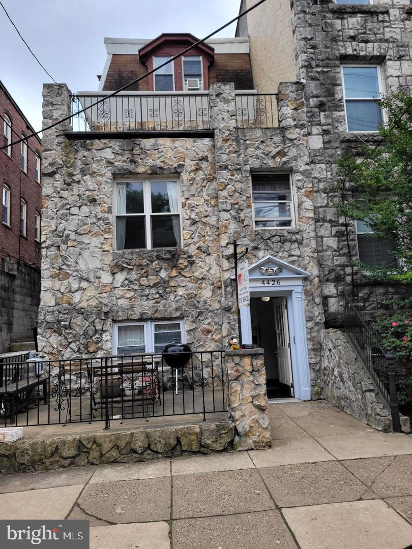 This meticulously maintained professionally managed 6 unit apartment building in the desirable Spruce Hill neighborhood of University City, West Philadelphia is fully occupied and runs like a well oiled machine. Basement level has a separate owner's office and kitchenette ( currently unused 7th unit) that can be added as extra living space to one of the existing first floor apartments to maximize rental amounts and profits or kept as it's current use to provide an office space for the building. Each apartment is separately metered for cooking gas and electric. Rents include heat, hot water, common area electric, and public water/sewer service. Tenants also have access to private coin operated laundry area. Each apartment features hardwood floors throughout, full modern kitchen, and spacious ceramic tiled bathroom with full sized tub/shower. Apartments #2nd Front and #2nd Rear each open onto separate private terraces. The #1st Front apartment is a bi level unit currently occupied as 1 Bedroom plus Den Suite. The 1st Rear apartment , currently occupied as a two (+) bedroom suite, is a bi level apartment with a direct entry to the spacious private side/rear concrete patio. The 1st Rear apartment was-(is) designed as a 3 bedroom suite with the further opportunity to be incorporated by direct entry with the Owners Office Suite -(door frame is already in place). The location of the Owner's Private office (two rooms + full bathroom/kitchen) Suite provides the opportunity to be joined with the 1st Rear bi level apartment to create a possible 5+ bedroom apartment. Please refer to the enclosed rent roll and fixed expense schedule. AFTER reviewing the enclosed Photos, Rent Roll and Fixed Financial Cost Schedule a financially qualified buyer may schedule a private tour of the grounds, the public areas of the building including the hallways, entry foyer, the utility areas plus the owner's office suite.