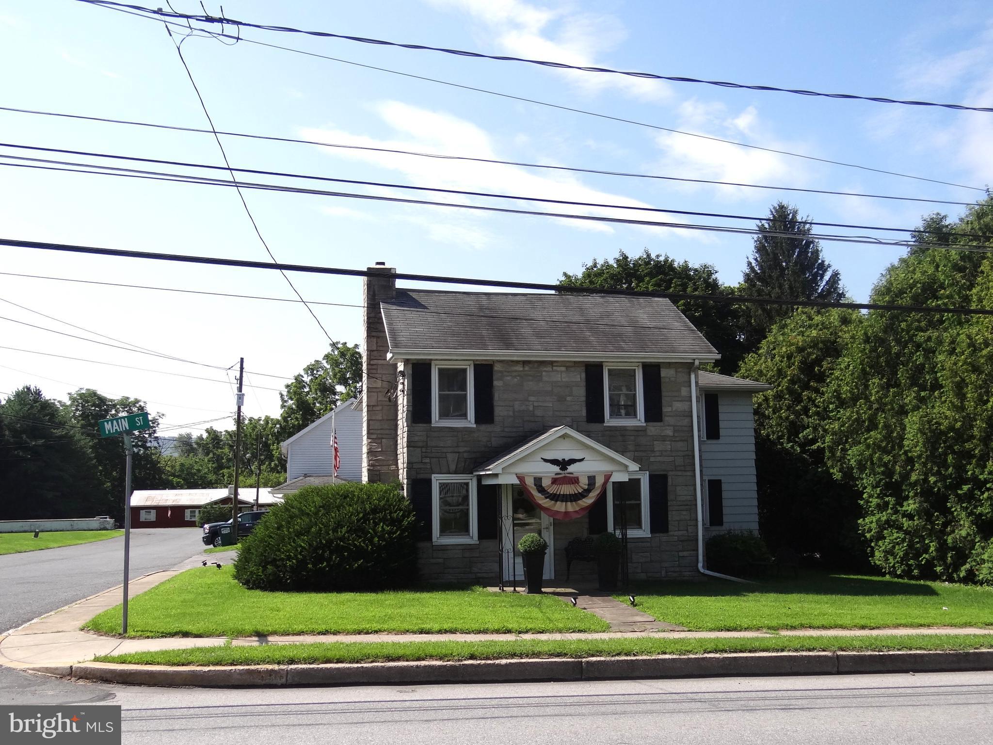 Spacious and affordable, 3 BR, 2 1/2 BA home in the heart of Morgantown. This home includes a 2-car, attached garage, an enclosed rear porch / family room, a great rear deck for entertaining and a partially finished basement w/ full bath. There is also a dining area w/ pine wainscoting & HW Flooring, a galley kitchen w/ a breakfast bar, a formal living room and a spacious laundry / utility room. Upstairs you will find 3 spacious bedrooms, a hall bath and HW flooring throughout. Conveniently located just minutes from Rt. 176 and the PA Turnpike for easy commutes this nice, affordable home in Twin Valley Schools could be yours!