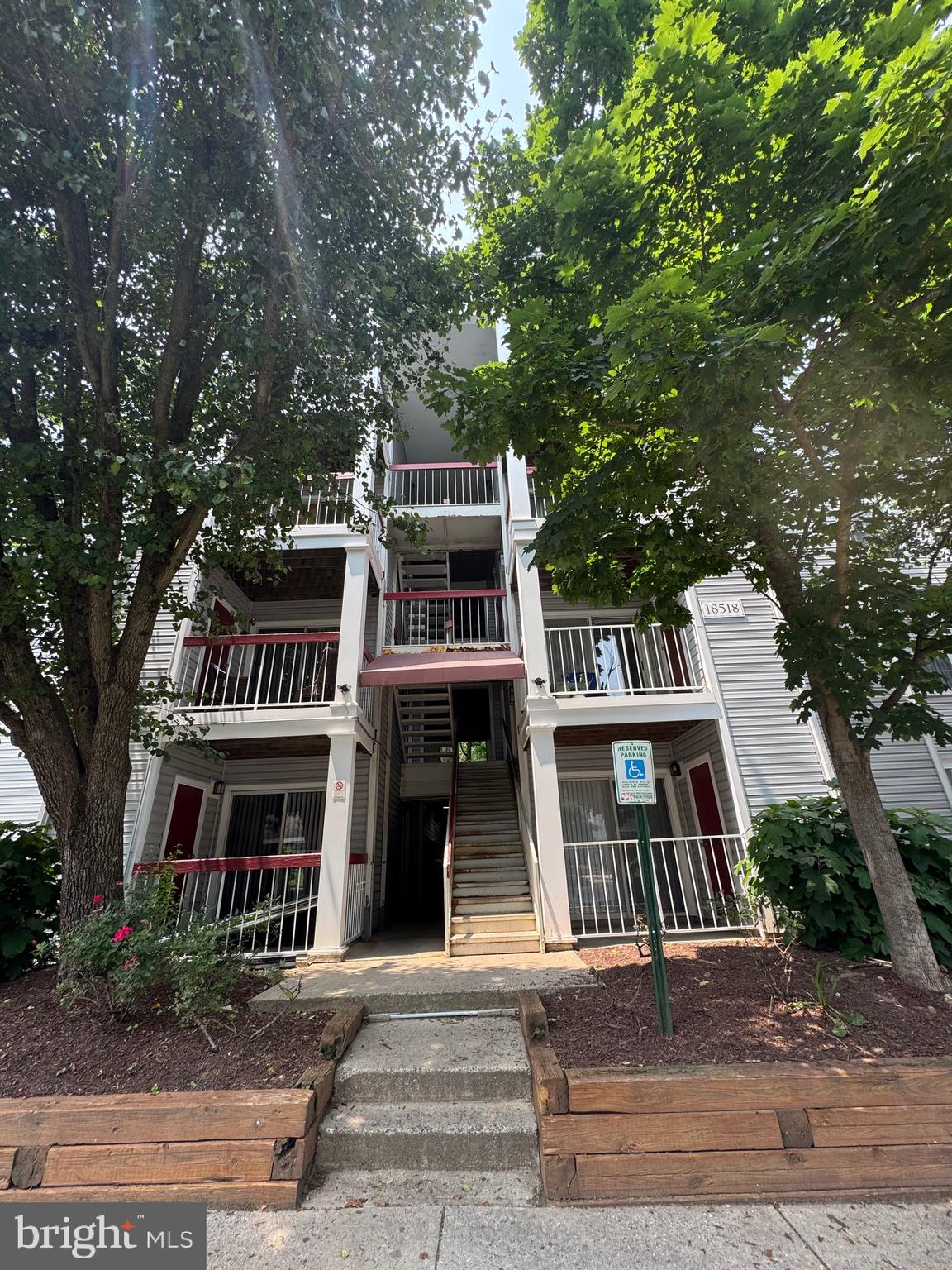 Welcome to this bright, spacious, updated one-bedroom condo with private balcony overlooking the woods. This unit is perfect for first-time buyers, downsizers, or investors seeking a turnkey property. Located in a peaceful wooded community, this top floor unit offers privacy, natural light, and move-in ready convenience. This unit features open-concept living area with vaulted ceilings and a cozy fireplace; new plush carpeting and fresh paint throughout; new Whirlpool stainless steel appliances, including refrigerator, electric stove, and microwave; new in-unit washer and dryer; modern marble-look tile flooring in the bathroom with new vanity and brushed nickel fixtures, large framed mirror, and upgraded lighting. It comes with a reserved parking space for owner convenience. Community amenities include a swimming pool, tennis court, fitness center, picnic area, and playground.