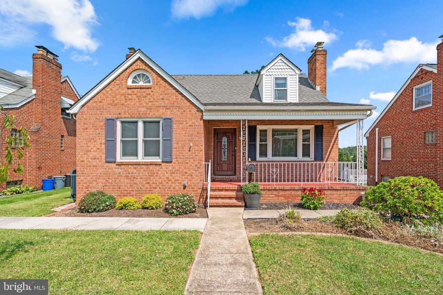 Step into this enchanting Cape Cod home where classic charm seamlessly blends with modern conveniences. From the welcoming covered front porch to the newer wood floors (2022) throughout, every detail has been thoughtfully designed. The spacious living room, featuring a cozy fireplace, sets a warm and inviting tone.

The heart of the home is the beautifully updated kitchen, offering farmhouse charm with its abundance of cabinets, two pantries, quartz countertops, and a stylish tile backsplash. Modern amenities include stainless steel appliances, a smart refrigerator, and a stove with a built-in pot filler. The kitchen flows effortlessly into the formal dining room, ideal for hosting around an oversized farmhouse table.

An additional living room, illuminated by numerous new windows (2021), provides a delightful view of the large, fenced-in backyard—perfect for entertaining or enjoying peaceful moments outdoors. Elevate your entertainment experience in the main living room, featuring a built-in Dolby in-wall surround sound speaker system for cinema-quality audio right at home! 

The primary suite is conveniently located on the main level, with a generously sized bedroom, an incredible walk-in closet with built-ins, and a fully updated en-suite bathroom. Enjoy modern comforts with a thermostat for perfect climate control, a main-level laundry room for added convenience, and a tankless water heater for endless hot water on demand!

Upstairs, find two large, carpeted bedrooms and a beautifully finished bathroom with a barn door. The fully finished basement offers ample storage space and additional flexibility.

Experience the perfect blend of timeless charm and contemporary convenience in this Cape Cod gem with an exceptional backyard retreat!