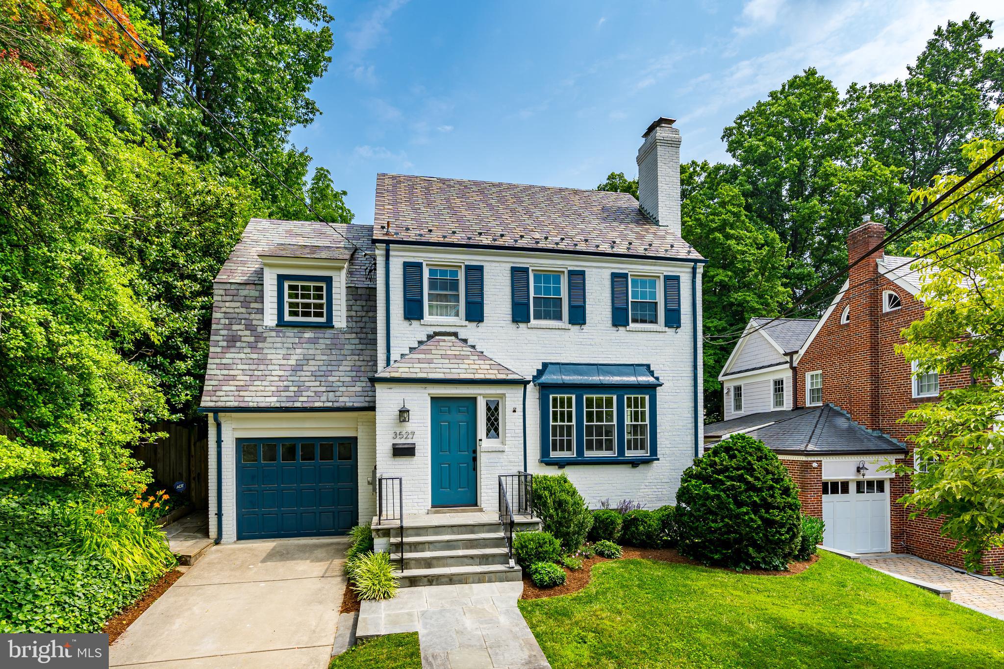 Absolutely enchanting brick colonial nestled in the heart of coveted Rollingwood Hills in Chevy Chase! Beautifully appointed home in a fairytale setting, with a gourmet kitchen, French doors, butler pantry, custom built-in bookcases, crown molding & two fireplaces. Large, south-facing 0.21 acre lot with a secluded and beautifully landscaped backyard, including a large stone patio and children’s playset, and surrounded by huge 50+ year old trees. 1-car attached garage plus a bonus large outdoor storage area. 3 bedrooms + 2 full bathrooms on the second/upstairs level, with another separate living area, bedroom, & full bathroom in the lower/basement level – perfect for an au pair or in-law suite. Dual-zone HVAC, new furnace, all new windows, & new washer/dryer -- all added since 2020. Located 3 blocks from Brookville Market, La Ferme, and a short walk down the street to Meadowbrook Park with tennis, basketball, fields, Candy Cane City playground, and Beach Drive / Rock Creek Trail!