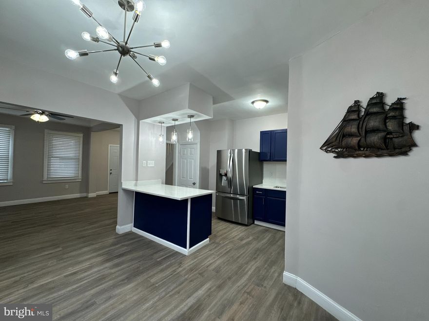 All of this is SURE TO WOW YOU! Welcome to 3114 Pelham Ave - a beautifully updated end-of-group townhome in the heart of Belair-Edison. This spacious 4 bedroom, 3 full bath, home offers over 1,500 square feet of comfortable living with thoughtful upgrades throughout, brand new kitchen and baths, lighting, flooring, granite, stainless and so much more! Each level touts a full bath and TONS of natural light! The bedroom level features generously sized bedrooms and a bright, modern, updated bath while the fully finished lower level provides flexible space, perfect for a guest suite, home office, or additional living area, another full bath, laundry, walk-out outdoor access and the BONUS of an over-sized attached one car garage!!! Additional highlights include central heating and cooling, a flexible layout, front porch, large covered rear patio and the convenient location near major commuter routes, shopping, dining, and neighborhood amenities like The Playground at Belair-Edison, Herring Run, Archbishop Curley and so much more!  A move-in-ready opportunity offering space, updates, and value—schedule your showing today. Additional highlights include central heating and air conditioning, a spacious attached garage, and a layout that works equally well for homeowners or long-term guests. Convenient access to shopping, schools, and major commuter routes makes this location easy and efficient. Move-in ready and thoughtfully updated—schedule your private showing today!!!