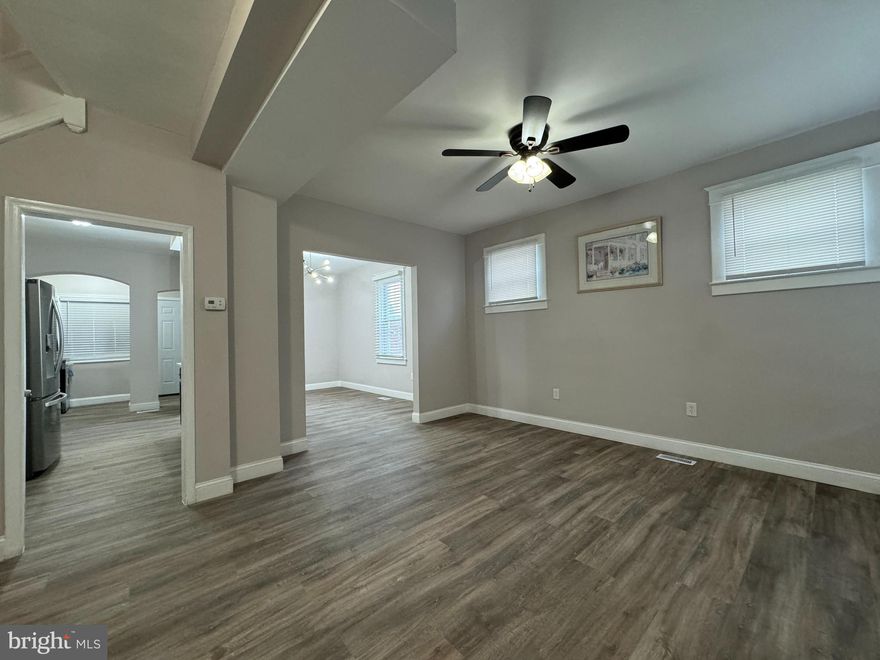 Welcome to 3114 Pelham Ave - a beautifully updated end-of-group townhome in the heart of Belair-Edison. This spacious 4 bedroom, 3 full bath, home offers over 1,500 square feet of comfortable living with thoughtful upgrades throughout, brand new kitchen and baths, lighting, flooring, granite, stainless and so much more! Each level touts a full bath and TONS of natural light! The bedroom level features generously sized bedrooms and a bright, modern, updated bath while the fully finished lower level provides flexible space, perfect for a guest suite, home office, or additional living area, another full bath, laundry, walk-out outdoor access and the BONUS of an over-sized attached one car garage!!! Additional highlights include central heating and cooling, a flexible layout, front porch, large covered rear patio and the convenient location near major commuter routes, shopping, dining, and neighborhood amenities like The Playground at Belair-Edison, Herring Run, Archbishop Curley and so much more!  A move-in-ready opportunity offering space, updates, and value—schedule your showing today. Additional highlights include central heating and air conditioning, a spacious attached garage, and a layout that works equally well for homeowners or long-term guests. Convenient access to shopping, schools, and major commuter routes makes this location easy and efficient. Move-in ready and thoughtfully updated—schedule your private showing today!!!