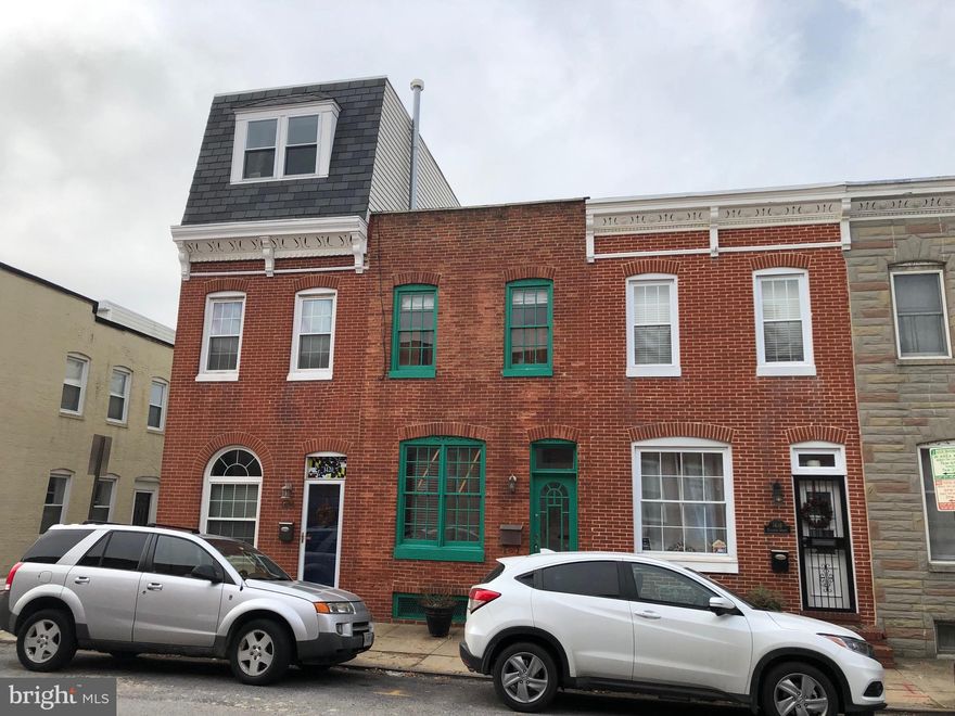 CHARMING 2 BEDROOM HOUSE ON POPULAR  PATAPSCO STREET.  LOADED WITH CHARM EXPOSED BRICK , WOOD FLOORS, BALCONY, DECK AND PARKING IN REAR.  KITCHEN HAS GREAT SPACE WITH STAINLESS REFRIGERATOR AND CERAMIC COUNTER TOPS. THE LARGE BATHROOM AWAITS YOUR TOUCHES.  GREAT POTENTIAL TO MAKE THIS HOME YOUR OWN