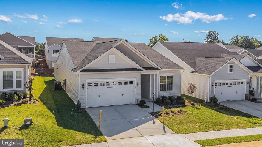 JINGLE ALL THE WAY!!! ***SPECIAL PRICING FOR LIMITED TIME***Resort-style living in a premier 55+ active adult neighborhood loaded with amenities and activities. This Killarney I floorplan offers  excellent single-level living and features amazing 10-foot ceilings enhancing  the large great room, separate dining room and  separate home office.  You'll love the impressive gourmet kitchen with over-sized island with pendants above, trendy upgraded cabinets with quartz countertops, backsplash, walk-in pantry and upgraded stainless steel appliances.  Relish the primary bedroom with huge walk-in closet and bath with double vanity, seated shower and private water closet.  Maximize your outdoor living enjoyment this season with the screened porch.  Don't miss the over-sized 2-car garage with oodles of extra storage space.  Prices and terms subject to change. This floorplan may also be available on an optional basement.