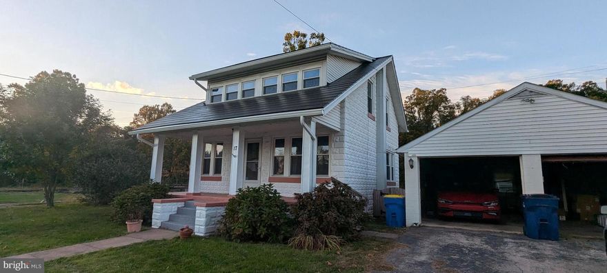 Welcome to 17 Spruce St.!   This Three bedroom 1.5 Bath has a lot of charm, but a lot of modern updates as well. The house is well maintained, starting with the front porch that was raised, leveled, and refinished.  The owner put on a new roof, but not just any roof but a Tesla Solar Shingled roof plus a Tesla Power Wall.  The house has a good sized Living room with large windows for a good bit of natural light. There is also a formal dining room with lots of natural light. The kitchen comes next with lots of cabinet space, then the mudroom  with a side exit and a pantry plus a half bath.  The second floor has three good sized bedrooms and a large bath with a walk in shower and a bathtub. The house has a full basement that was recently painted, Washer and dry are there too. The Tesla Power Wall is also in the basement along with a newly installed Sump Pump. There is also a  2 car detached garage and a fenced in flat backyard that maintains itself with a Robotic mower complete with a charging station and its own docking house. Check this house out!!