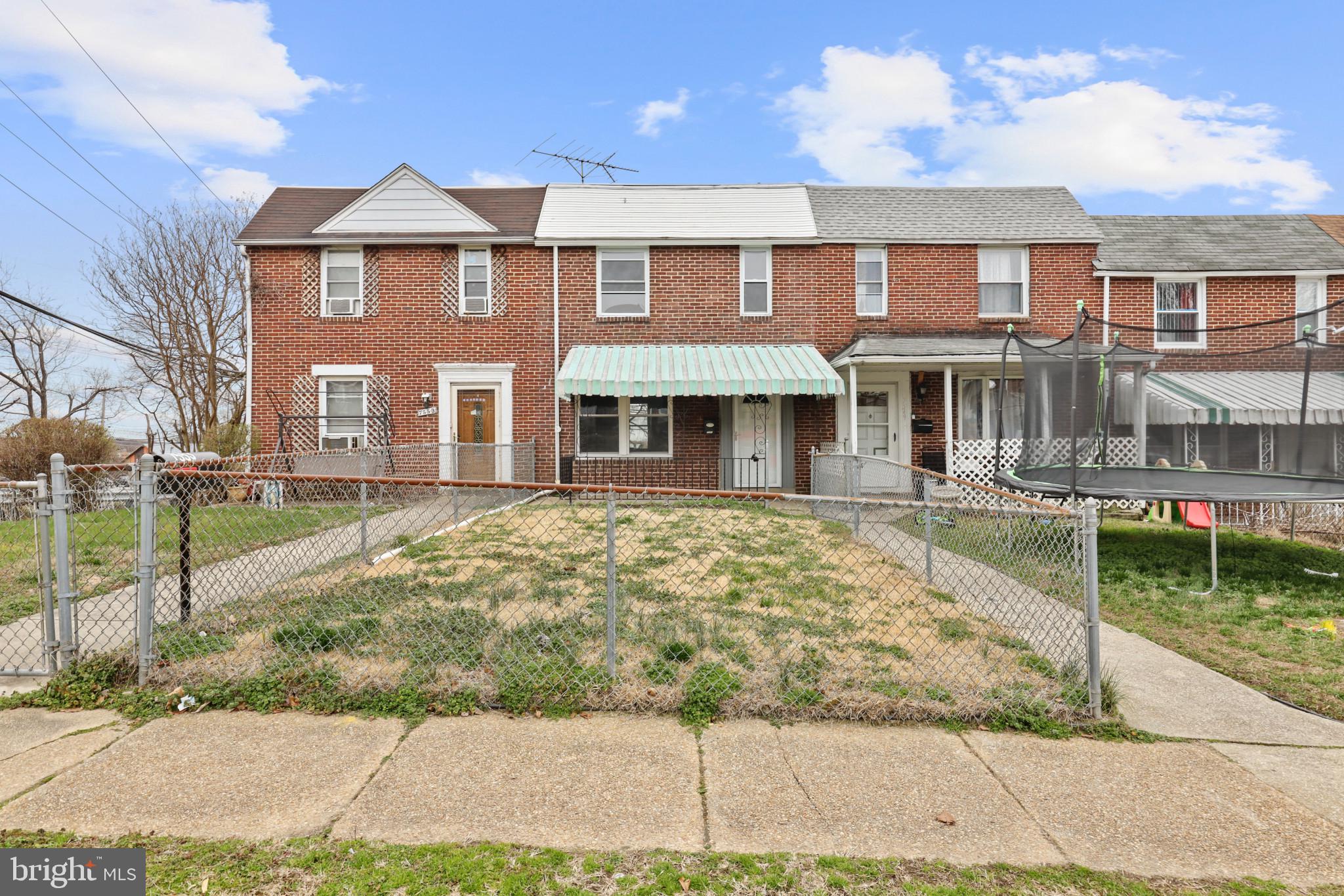 Fully renovated 3 bedroom home with parking pad! This home is available for immediate occupancy. White cabinets, granite counters, stainless steel appliances. Wood floors throughout. Washer and dryer in lower level.