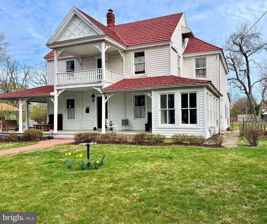 Step back in time while enjoying modern-day comforts in this beautifully preserved 1888 farmhouse, brimming with character and history. Nestled on a spacious lot in the heart of Berwyn Heights, this one-of-a-kind home features classic architectural details, original hardwood floors, and millwork that speak to its rich heritage.

From the moment you step onto the welcoming front porch, you’ll feel the warmth and soul of this home. Inside, high ceilings and tall windows bathe each room in natural light, while vintage details—like the ornate stair railings and period-style trim—evoke a timeless charm. 

Cozy up by the wood burning fireplace or open a book in the bright sunroom. The large kitchen offers a perfect blend of rustic charm and modern convenience, with updated appliances and ample space for gathering. A laundry room and bonus room, with access to the backyard, can also be found right off the kitchen.

Upstairs are four bedrooms with tree-lined views from the windows. The updated full bath features tasteful fixtures that stay true to the home’s original style.  The additional "tub room" has potential to become a large primary bathroom. On the third level you'll find the generous attic space full of possibilities!

Outside, the expansive yard offers plenty of room to garden, entertain, or simply enjoy the peaceful surroundings. The home also has a garage with a workshop room and the cellar provides additional storage space.

Whether you're sipping coffee on the porch or hosting friends under the stars in the backyard, this home offers a rare blend of history, space, and comfort.

Near beautiful Lake Artemesia, walking/biking trails, playgrounds, commuter routes, shopping and more!

Don't miss your chance to own a piece of Berwyn Heights history—this home is a true treasure.