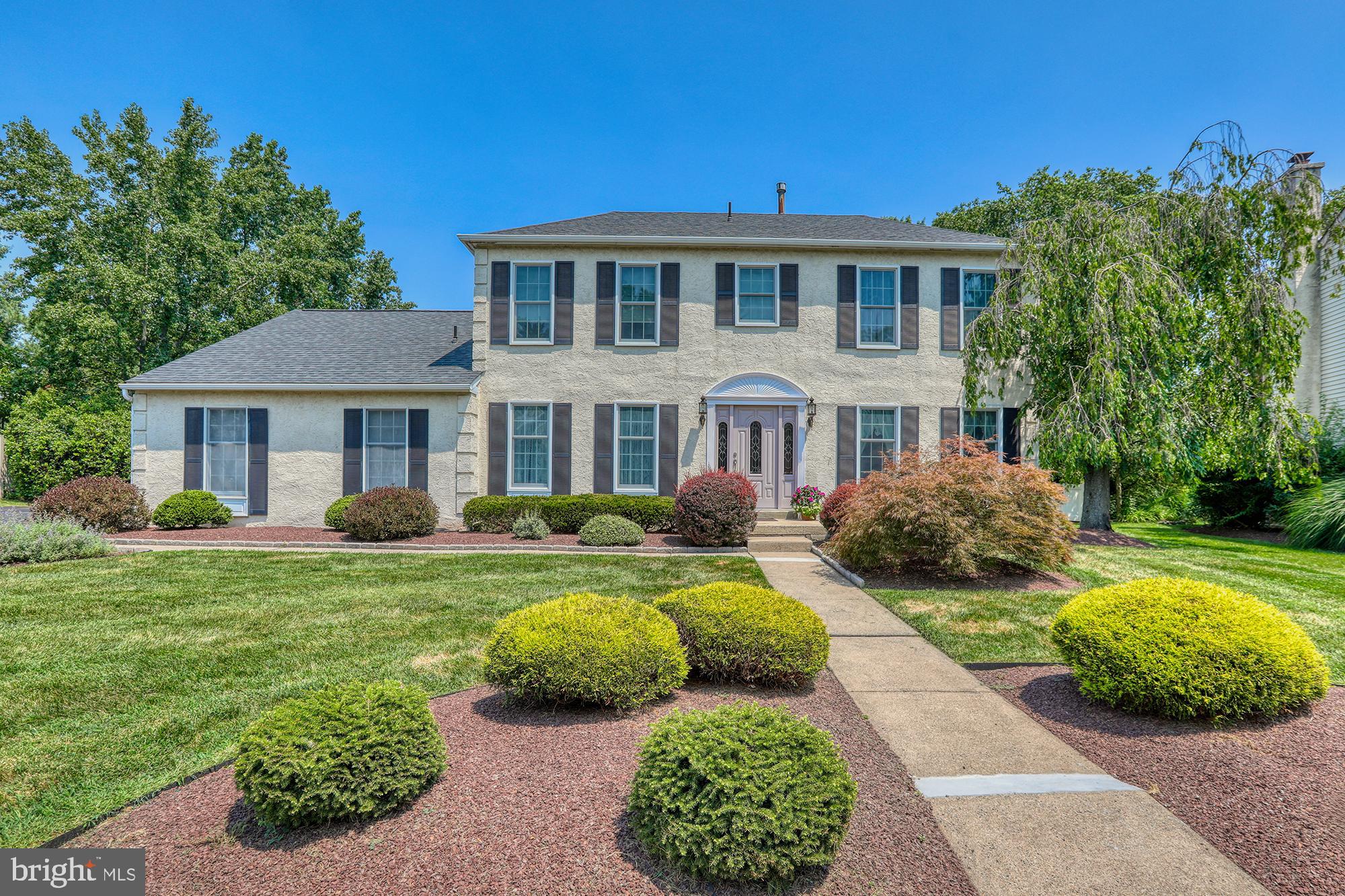 Bucks County at Its Best!
Welcome to this stately Colonial offering 4 bedrooms and 3.5 bathrooms, including a private first-floor in-law suite with its own entrance. The suite features a vaulted-ceiling living room, dining area, bedroom, and full bath—ideal for multigenerational living , guests or private office. Enter through a spacious center hall into a bright and inviting layout. The main level boasts a large living room, formal dining room, and cozy family room with gleaming hardwood floors. The expansive eat-in kitchen is a chef’s dream, complete with vaulted ceilings, skylight, and plenty of natural light. Upstairs, the primary suite includes a sitting area, freshly painted walls, brand-new wall-to-wall carpeting, a walk-in closet, soaking tub, and separate shower. One of the original bedrooms has been expanded to create an extra-large room—perfect for a shared space or a second primary bedroom. Additional features include a spacious laundry room with washer and dryer included, a partially finished basement with professional waterproofing. Newer roof and HVAC systems for peace of mind. Garage was converted to the In-law Suite. Step outside to your own backyard oasis featuring a large deck overlooking an in-ground pool, surrounded by lush, professional landscaping and a fenced in yard. A storage shed offers added convenience. Located in a charming sidewalk-lined neighborhood within the award-winning Blue Ribbon Neshaminy School District. Enjoy close proximity to Core Creek Park, Tyler State Park, and the Delaware Canal State Park, as well as easy access to I-295, Route 1, and regional rail lines for commuting to Philadelphia and New York. One Year Home Warranty included.