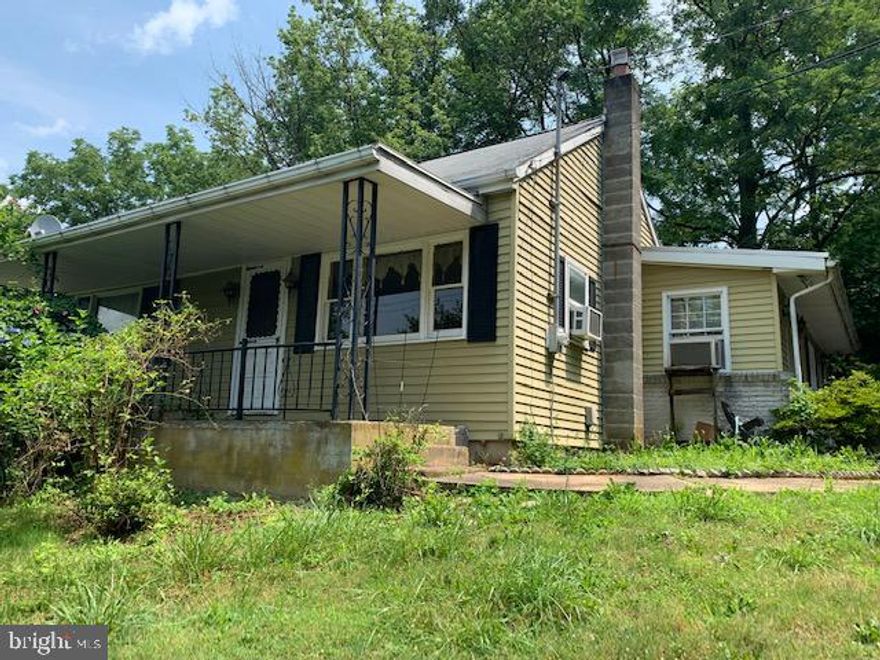 One floor living situated on 1.9 acre lot in Dallastown SD with plenty of space to expand. Completely remodeled large country kitchen featuring a sky light, kitchen island and loads of counter and cabinets. First floor laundry. Partially finished attic area.  Updated bathroom. Large attached block garage. Appliances convey in current condition. Property being sold AS IS.