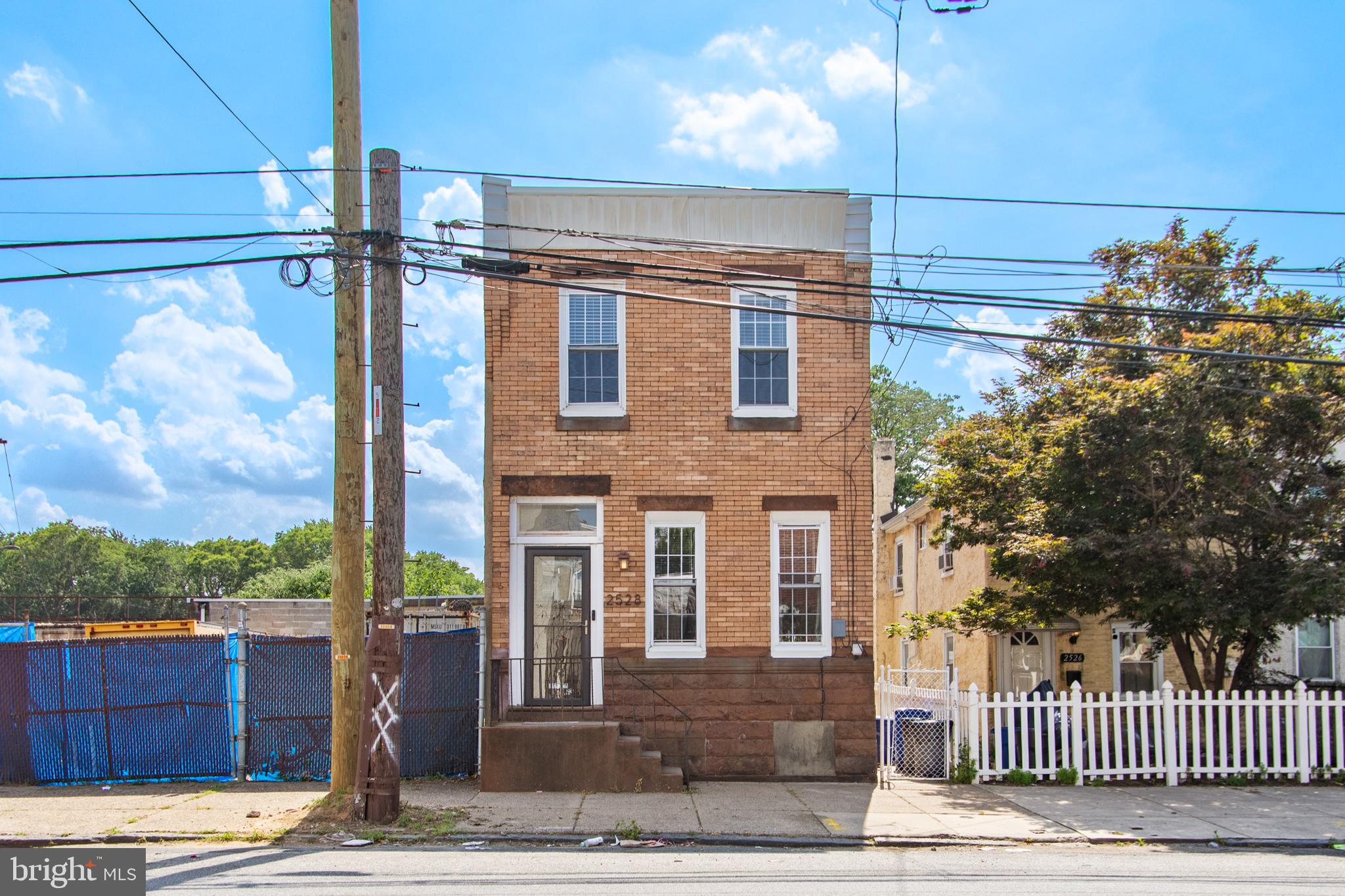 Conveniently located within minutes of Fishtown and I-95, this charming Port Richmond home stands alone with no connecting property and is just a short stroll from nearby parks and an array of new eateries, stores, and coffee shops—making daily life simple and enjoyable.
Step into the spacious, open-concept first floor, featuring high ceilings, abundant natural light from numerous windows, and three ceiling fans for added comfort. The dining area flows seamlessly into the kitchen, which boasts elegant cherry cabinets, granite countertops, stainless steel appliances, and a stylish glass tile backsplash. A central island provides additional storage and counter space—perfect for meal prep or gathering with guests while entertaining.
Convenient first-floor laundry features a brand-new washer and dryer and leads to a tasteful half bath. Step outside to an oversized backyard complete with a deck, concrete patio, and lush green lawn—perfect for relaxing or entertaining. As a bonus, fragrant honeysuckles bloom along the fence, filling the air with a sweet aroma. This outdoor space is a blank canvas ready for your personal touch and dream oasis.
From the kitchen, access the full basement featuring high ceilings and endless potential—perfect for a home gym, music studio, workshop, additional storage, or creating your own custom space.
A newly installed custom railing guides you to the second floor, where you’ll find a full bathroom, a hallway closet, two comfortable bedrooms, and a spacious primary bedroom. Each room is equipped with its own ceiling fan, abundant natural light, and additional storage space above the closets.
Don’t miss the opportunity to make this exceptional home your own—offering comfort, customizable space, and a prime location all in one inviting package.
