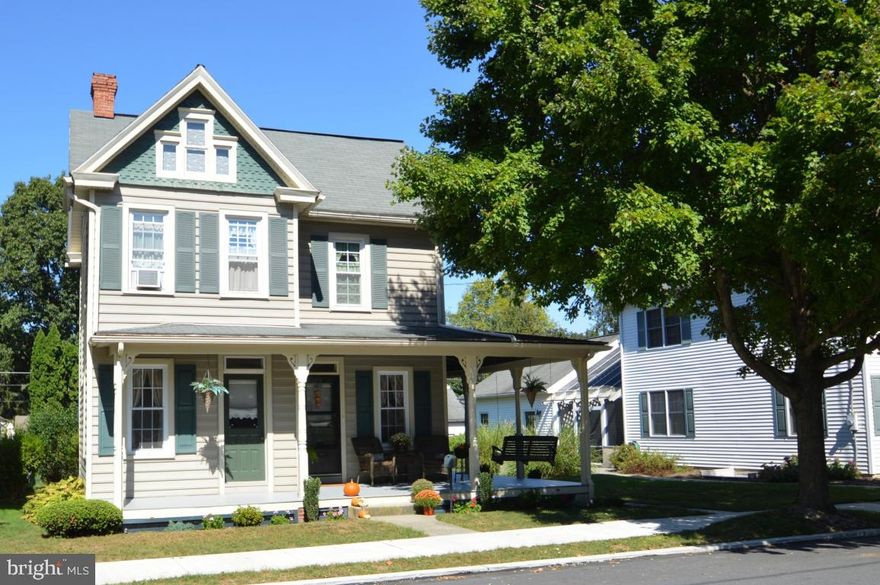 Beautifully well maintained home ready to go! This warm and charming property boasts original woodwork, hardwood in kitchen and softwood floors in the remainder.  All major appliances included. New windows, siding and a list of other items found on upgrades doc. Lovely wrap around front porch with swing included.  Wonderful entertaining deck to rear. Minutes from downtown shops, and festivities but nestled on a quieter street.