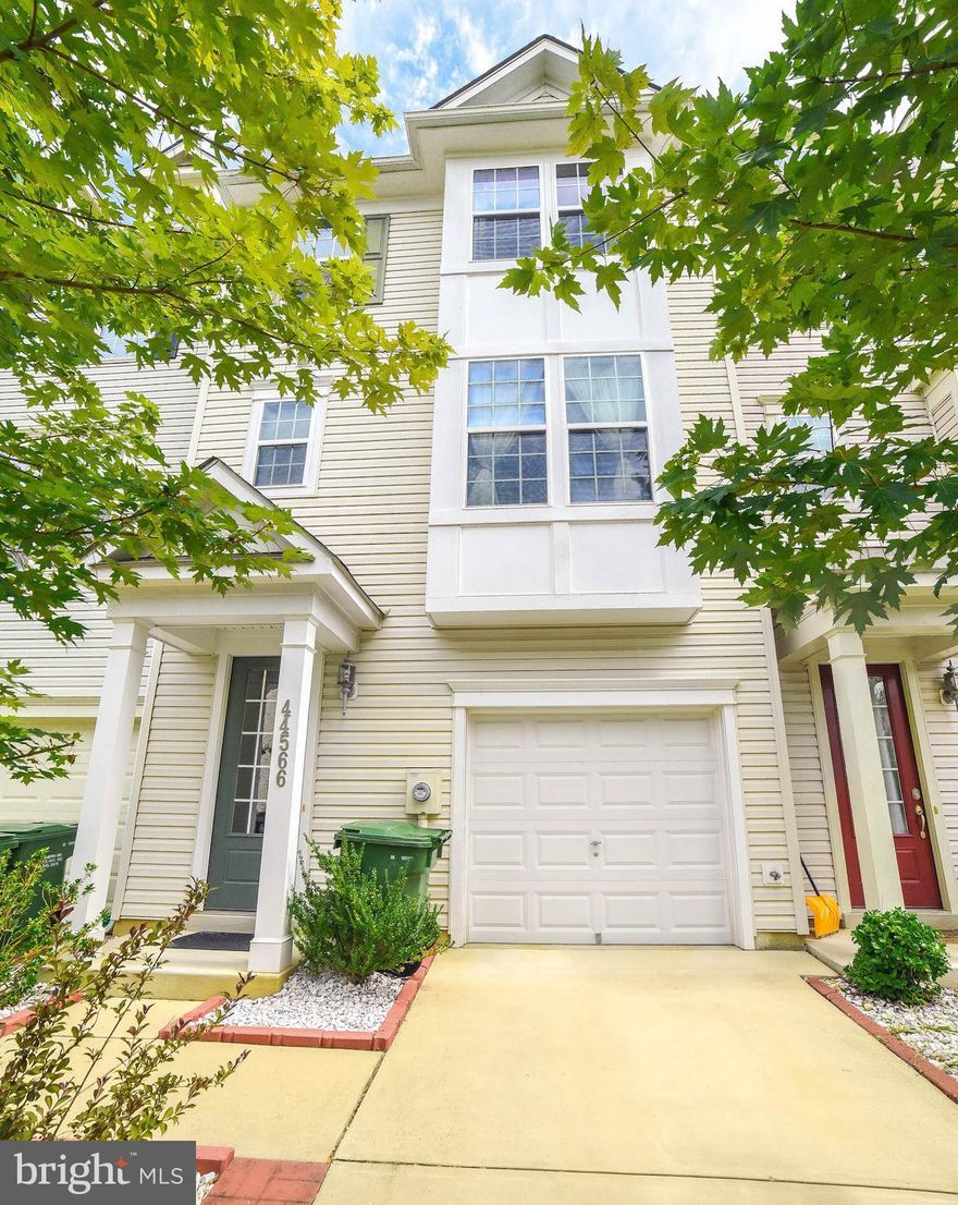 Why wait for new construction-this TH is available now and in move in condition!  Open floor plan on second level with spacious family room.Lower level can be finished off as a rec room or 4th Bdrm. Nice upper level deck and lower level patio for entertaining. Easy commute to PAX and convenient to schools/shopping/restaurants. Community boasts pools, tennis/basketball courts, bike trails, etc.