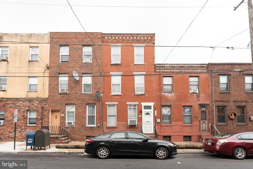 New to the market large 3 story brick front straight thru in desirable section of the city. This area has experienced gentrification but this one needs to be brought back to 2021. Good bones is  the best way to describe this house. This is an estate sale and is being sold as is. Put you touch on this rarely offered gem. Very to close to Passyunk  and all it's shopping, dining and night life.
Price reflects condition.