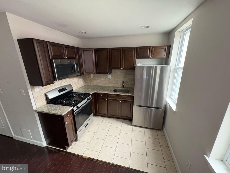 This beautiful, newly renovated second apartment features three bedrooms and one bathroom! The gorgeous kitchen includes beautiful cabinets and ample cabinet/counter space. Appliances included. The rooms are bright and open, with a lot of storage space and windows. The full bathroom  is sleek, modern, and comfortable.

Close here you can find the Nelson Playground, Taller Puertorriqueno, Inc, also many shops and a bus line 
What are you waiting to apply for this beautiful house?