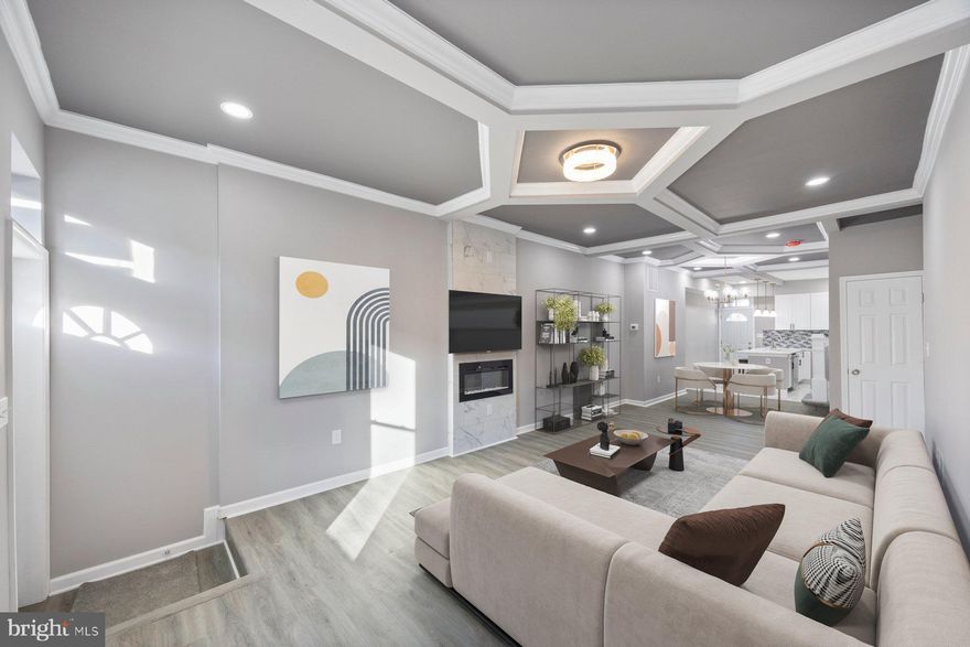 Welcome to this stunning end-unit townhome in the heart of Baltimore! This brand-new home boasts a complete renovation, featuring new framing, electrical, plumbing, HVAC, gas line, and water heater. Every detail has been meticulously thought out to provide a luxurious living experience.  As you step inside, you'll be greeted by the elegance and sophistication that permeates every room. The gourmet kitchen is a true showstopper, equipped with stainless steel appliances, quartz countertops, and brand-new cabinets. The spacious master bedroom features a half bath and a private balcony, perfect for relaxing and taking in the surroundings.  With four full bedrooms and 2.5 bathrooms, there's ample space for family and friends. The top floor boasts three bedrooms with generous closet space, ceiling fans, and 1.5 bathrooms. The main level features a cozy family room with a fireplace fixture, perfect for chilly evenings.  Step outside and enjoy the brand-new deck and patio area, ideal for al fresco dining and outdoor entertaining. A six-foot wooden fence surrounds the patio, providing a secure and private space. The fully finished basement offers additional living space, complete with a family room, bedroom, and full bathroom.  Convenience is key in this location, with public transportation just a short walk away. John Hopkins Hospital is merely two minutes away, and the famous Patterson Park is within walking distance. Enjoy easy access to shopping, restaurants, and Baltimore's best attractions, including the stadiums and National Harbor.  This corner unit townhome offers ample parking right outside your front door. With its unbeatable location, luxurious amenities, and meticulous attention to detail, this home is a true gem in Baltimore. Don't miss out on this incredible opportunity – schedule a viewing today!