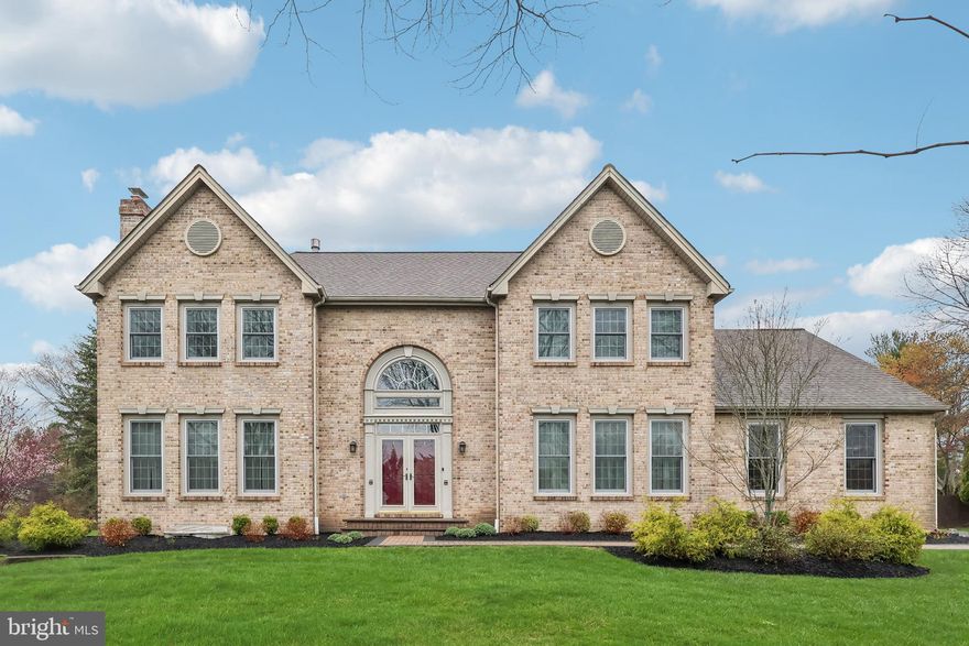 Welcome to 1513 Brookfield Rd, a stately brick home in one of Yardley’s most desirable neighborhoods. This beautifully designed home offers a perfect blend of elegance, comfort, and convenience, with a prime location that enhances your lifestyle.  With 9-foot ceilings on the first floor and a thoughtful layout, this home offers a perfect blend of elegance and functionality.  The impressive two story entryway is flanked by a living room with a fireplace and the dining room.  Adjacent to the living room is a private home office with custom built-in bookcases allowing a private sanctuary for the at home worker. The family room is a stunning focal point, featuring a vaulted ceiling adorned with rich wood paneling, exposed wood beams, skylights, recessed lighting and a cozy fireplace—ideal for gatherings. There is an abundance of windows which makes this room light and bright while allowing picturesque views of the back yard.  The bright and airy kitchen boasts white cabinetry, granite countertops, premium stainless steel appliances, and a breakfast area that overlooks the expansive backyard.  Upstairs, the spacious primary suite includes a sitting area, triple closets plus a walk in closet,  an updated en-suite bath with a vaulted ceiling, skylights, a frameless glass shower, and a private water closet. Three additional generously sized bedrooms share a neutral hall bath with a double vanity and a tub-shower combination.  The finished lower level offers exceptional versatility, featuring two additional rooms with egress, a full bath, and plenty of space for entertaining, working out, or hosting guests. This area is perfect for a large family or au-pair set up. There is a spacious 3 car garage which is equipped to accommodate your modern auto and storage needs with an EV charger. The backyard area is stunning.  Enjoy the beautifully designed paver patio with a swim spa, hot tub and large seating/entertaining area. This is all set within a large, lush, fenced-in backyard with a storage shed. A convenient gate in the fence provides access to the sidewalks, walking trails and easy access to the Garden of Reflection. Here you can wander this beautiful park or meet some friends for pickleball.   Beyond the home, enjoy all that this sought-after Yardley location has to offer. Just minutes away, you’ll find the charming streets of downtown Newtown with its boutique shopping, fantastic dining, and community events. Outdoor enthusiasts will love being near The Garden of Reflection, Makefield Highlands Golf Course, Washington Crossing Park, and Core Creek Park, perfect for hiking, biking, pickleball and waterbased activities. Commuters will appreciate the easy access to Routes 295 and 1, making trips to Philadelphia, Princeton, and New York City a breeze. The area is also known for its highly rated schools, making it a fantastic place to call home.  Don't miss this incredible opportunity to own a home that truly has it all—modern comfort, a prime location, and a vibrant community!