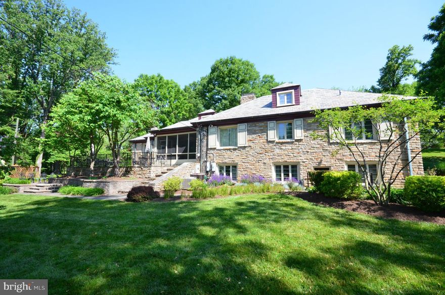 Exquisite Custom Stone 6/7BR 5BA Home situated on lushly landscaped park-like grounds w/impressive stone terrace & Extensive hardscape. Stunning paneled Library, Banquet sized Dining Rm, Beautifully renovated Kitchen w/top of the line appliances and custom cabinetry. Updated baths and New Windows.  Expansive daylight LLVL includes an au pair suite, full kitchen, fam rm, wet bar, office and more!