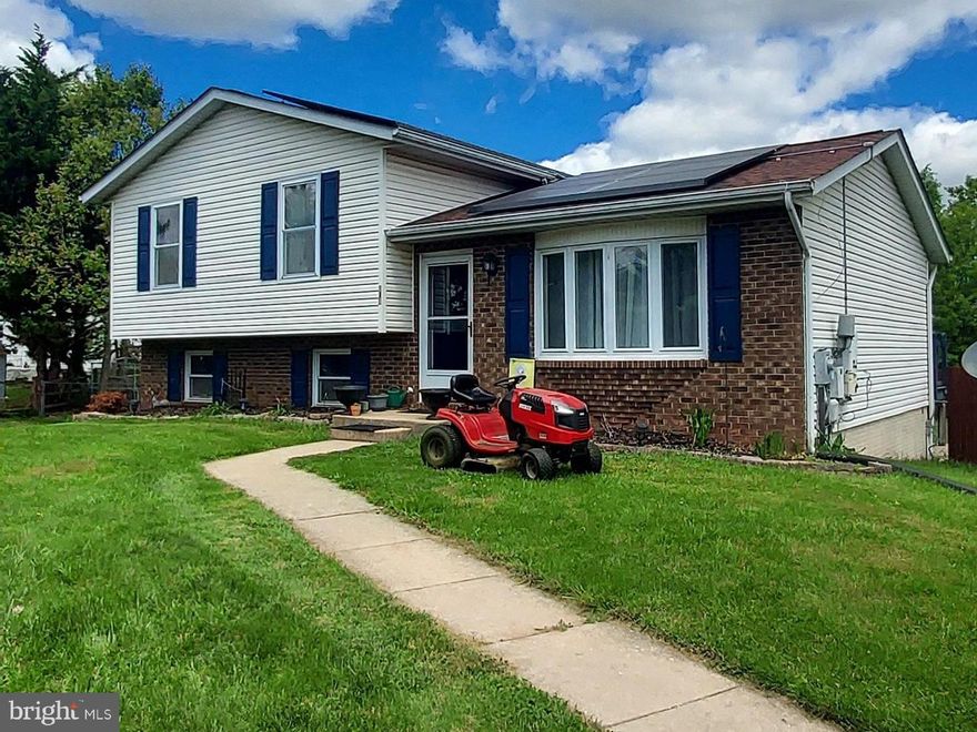 3 bedroom 2 bath Split Level home with 4 levels finished  in Taneytown area.    The main level invites an open floor plan into living room, dining area and kitchen.  Conveniently, the dining area will lead you to the deck,  overlooking the fenced in backyard and patio.   In  the privacy of the upper level, you will locate 3 bedrooms and one full bath.  Lower level 1, has an additional finished room, hobby or craft room, and laundry area.   As you continiue to Lower level 2, you will be greeted with an additional carpeted room, ideal for an office or perhaps, needed  personal space   A sliding barn door separates the main level to Lower level 1.  A covered canopy can accommodate parking for  one car,
Solar panel enegy purchased in  October 2016 with a 20 year  term transferable to new buyer.
PROFESSIONAL PICTURES COMING S0ON