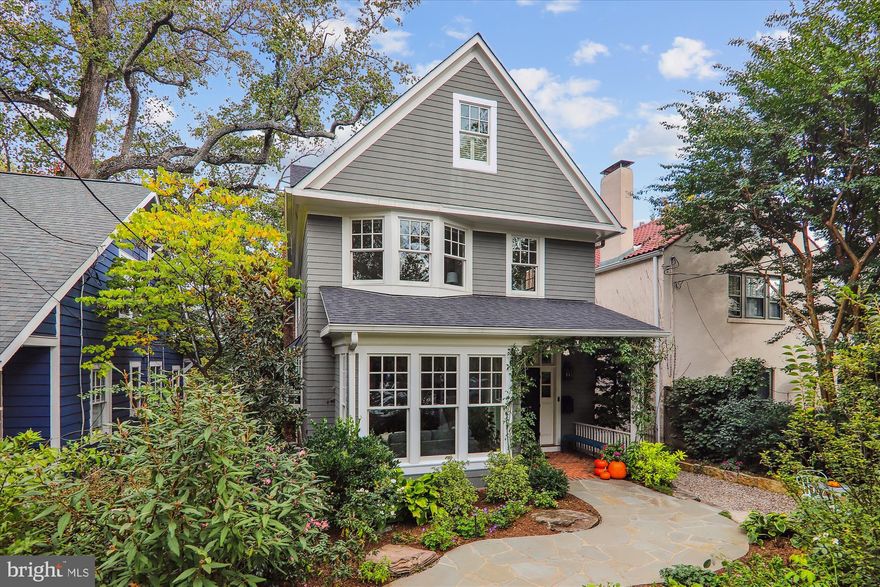 Pictures Coming Thursday (10/17/24)

This stunning farmhouse-style home, features an expansive layout with 5 bedrooms and 4.5 bathrooms, combining traditional charm with modern luxury. Built in 1994, the home has been beautifully updated and expanded, making it much larger than it appears.
Upon entering, you are greeted by a welcoming foyer with a double coat closet and a convenient powder room. The gorgeous eat-in kitchen is a chef's dream, equipped with high-end finishes, including a 48-inch Wolf range, a Subzero fridge/freezer, marble countertops, and an oversized stainless steel island that connects to a den with a charming bay window. The first floor boasts spacious living areas with soaring 9-foot ceilings, hardwood floors featuring inlaid walnut, a grand dining room that seats 10-12, and a large living room complete with a wood-burning fireplace. An enchanting sun-drenched family room addition features walls of windows, a gas fireplace, and stairs leading to the serene back patio.
The second floor features a luxurious primary suite with cathedral ceilings, tree-top views, two walk-in closets, and a spa-like bathroom  with a soaking tub and rain shower, two additional bedrooms, each with large closets and a shared modern bathroom. The third floor houses a 4th bedroom with two closets and a full bathroom.
The expanded and renovated lower level offers a large walk-out recreation room with cork floors, a fireplace, a built-in desk area, a 5th bedroom, a lovely full bath, a temperature-controlled wine cellar, a laundry room, and ample storage space.
An oasis in the city, the exterior features a charming front porch and a beautifully landscaped yard adorned with climbing roses and mature plantings, as well as a serene patio with water feature. The property is maintenance-free, equipped with an underground sprinkling system and landscape lighting.
Situated across from Lafayette Pointer Park and Lafayette Elementary, the home is just one block from Broad Branch Market and only a few blocks from the shops and restaurants along Connecticut Avenue. The METRO is just over a mile away, offering the perfect blend of city living within a tranquil neighborhood. This home is a must-see for those seeking expansive space and high-end finishes in an ideal location.