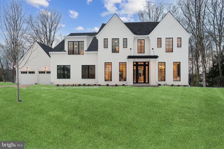 Welcome to 8561 Horseshoe Lane, an exquisite residence nestled on a prime two-acre lot in the prestigious neighborhood of Fawcett Farms/Potomac Ranch. This thoughtful masterpiece boasts nearly 9,000 square feet of meticulously crafted living space, showcasing the finest finishes throughout an exceptional floor plan.

Upon entering, you are greeted by soaring 10-foot ceilings, an abundance of natural light and an elegant ambiance that flows seamlessly from room to room. The main level features a luxurious suite complete with a private laundry area, perfect for guests or extended family. The home offers a total of six bedrooms, including a grand primary suite with a spa-like bath, providing a serene retreat.

With eight bathrooms, including seven full baths and two half baths, convenience and comfort are at the forefront of this home's design. The gourmet kitchen is a chef's dream, featuring a spacious pantry equipped with a beverage center and sink, ideal for entertaining.

The residence includes an oversized four-car garage, offering ample space for vehicles and storage. Three custom fireplaces add warmth and charm, including one in the expansive screened-in porch, which opens to a private grilling deck—perfect for outdoor gatherings. You will also enjoy a custom elevator that services all three levels!

The lower level features a finished basement, providing additional space for recreation or relaxation. It feels much more like a third level than a basement due to all the natural light and offers a custom wet bar, craft or theater room, gym or billiards area, full bedroom and two full baths! It walks right out to the covered flagstone patio and spacious 2 acre lot.

The expansive lot offers plenty of room for a pool and pool house, allowing for endless possibilities to create your own outdoor oasis. This home is a true gem, offering modern elegance and unparalleled luxury in one of Potomac's most sought-after communities.