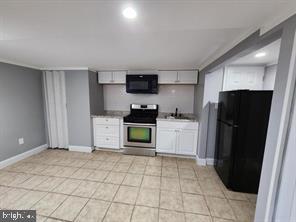 Gas,Electric and Water included in rent. Nice size lower level Apartment near Morgan State University. It has a Washer and Dryer, full kichen and a modern basement. Gas and electric is included as well as the water bill. Move in with 1 months rent and 1 months security deposit.