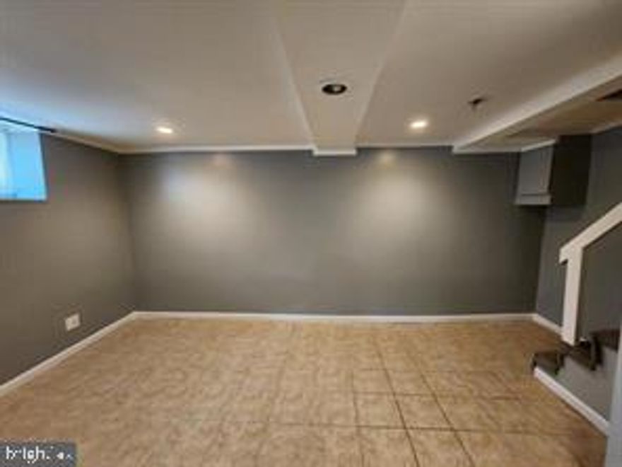 Gas,Electric and Water included in rent. Nice size lower level Apartment near Morgan State University. It has a Washer and Dryer, full kichen and a modern basement.  Gas and electric is included as well as the water bill. Move in with 1 months rent and 1 months security deposit.