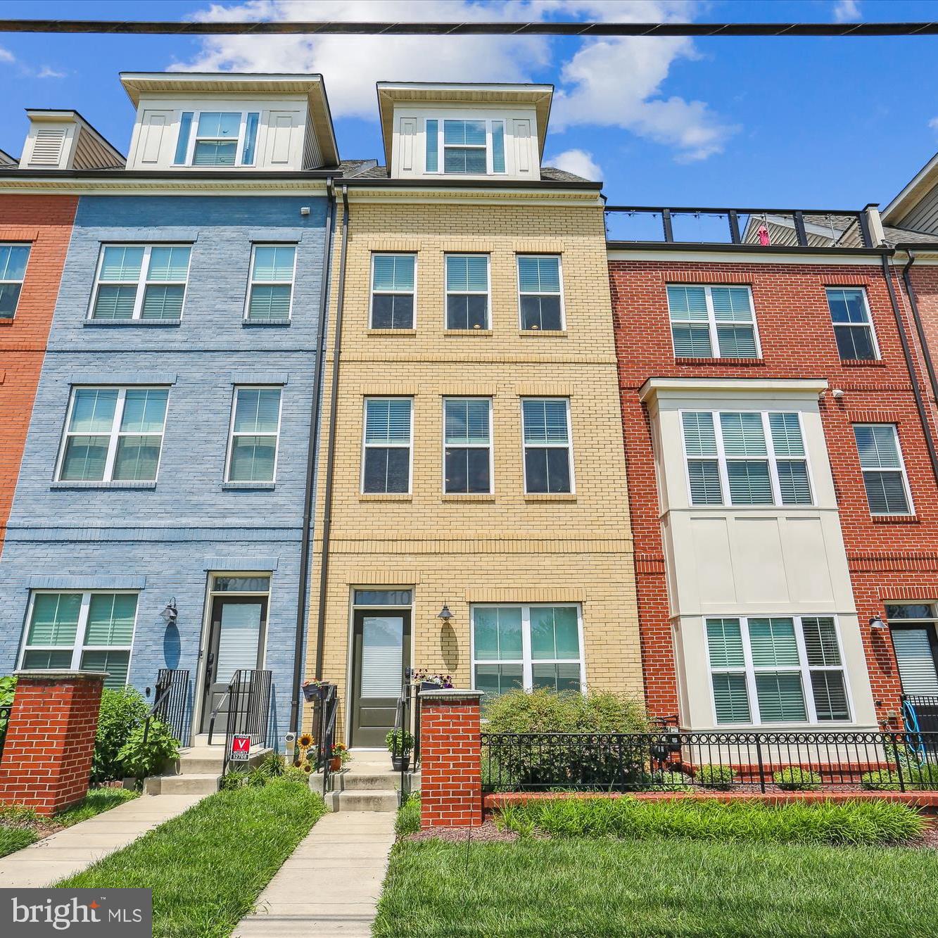 Open House - Saturday (8/16) 12 - 2pm. Beautifully decorated, sundrenched Brick-front 3 Bedroom, 3 1/2 Bath Townhome in Silver Spring. Steps to Glenmont (Red Line) Metro Station. This modern home - built just 6 years ago - offers an open floor plan and luxury living coupled with today's conveniences. Enjoy the sleek kitchen design with engineered hardwood floors, Whirlpool stainless steel appliances, granite countertops, designer fixtures, a large island, high ceilings and a dining area. The kitchen opens to a spacious family room with engineered hardwood floors, built-in bookshelves and a gas fireplace and a powder room. Upstairs a spacious bedroom suite includes a large closet and an en-suite bathroom. Additionally there is a second bedroom, a hallway full bath with tub and shower and a laundry closet with full size front load washer and dryer . The upper level floor boasts a primary bedroom suite with a full bath and large walk-in closet, an office nook and an outdoor deck. All three staircases have hardwood floors. The entry level includes an attached two car tandem garage with a large storage area. Upgrades include a brand-new HVAC system, California Closets built-ins, 240-volt outlet for a charging station, Guardian security system, Ring doorbell and an Ecobee thermostat. Located in a desirable neighborhood , this home is minutes from the Glenmont Metro Station and the ICC making commuting effortless. Enjoy Wheaton Regional Park, Brookside Garden, shopping centers, restaurants. A stunning home in one of Montgomery County's most sought-after locations with low maintenance. Don't miss out. Call LA with any questions......