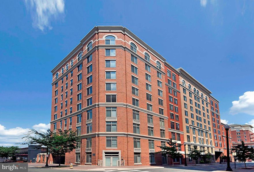 Beautiful Penthouse Unit located one block from the Clarendon Metro Station. Walt to Whole Foods, Trader's, Shops, Restaurants, Entertainment. Well maintained unit with hardwood floors.  Open kitchen with Granite Countertops, and  Stainless Steel Appliances. The Unit has ample windows with lots of Natural Light. There is a Gas Fireplace in the Living Room. In addition, there are two secured parking spaces plus extra storage space. Enjoy the amenities that the Station Square Condominium offers to include the Pool, Party Room, and more...