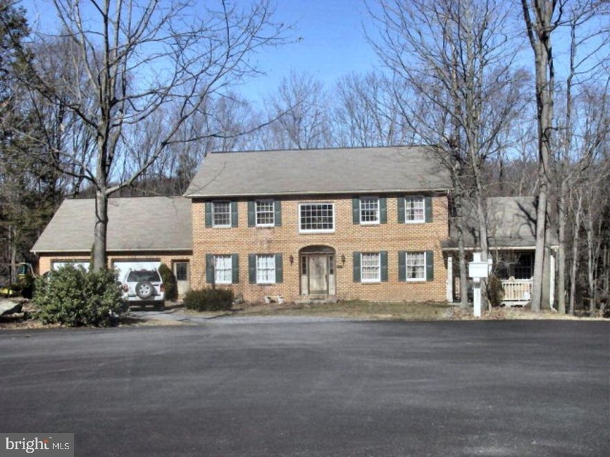 Large 2-Story Colonial on a 2.67 acre lot situated in a quiet cul-de-sac in Brookshire. Brick front, attached 2-car garage. Finished daylight basement with bar, den and 4th bedroom. Vaulted ceilings, sunroom w/ tile flooring. Open entryway, wooded lot with stream at rear of property, oak hardwood flooring and crown molding in dining room, kitchen open to family room, breakfast nook & Corian countertops, fireplace in family room, 2nd floor laundry, master bedroom with 2 walk-in closets and full bath.  Mailing Address Continued: Pottsville  Color: Red  Amp: 200