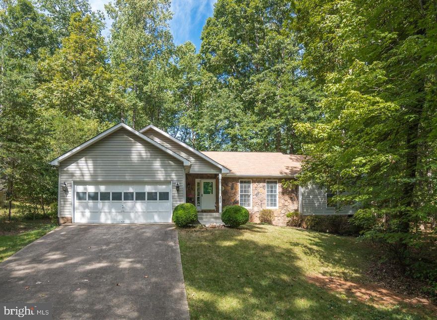 This Three Bedroom/ Two Bath Rambler offers a unique floorplan and a great location. Situated on a quiet street, walking distance to the Golf Course and minutes from the Clubhouse, Fitness Center and front gate, this home provides privacy and convenience.  Spacious Kitchen and Dining Room, Living Room with gas fireplace and large Three-Season Room with adjacent Deck allows many options for both indoor and outdoor living.  The large Master Bedroom en-suite features double vanities and with the split-floor plan the two additional bedrooms are located on the opposite side of the home. The house has a great flow with the separation of living areas and the vaulted ceilings adds to the sense of spaciousness. The two-car garage and large crawlspace offer additional options for storage.  Often called,  Virginia s Best-Kept Secret - Live like you re on vacation EVERYDAY in amenity rich Lake of the Woods! Great commuter options to the Washington DC Job market (just over 60 miles to the new Amazon Headquarters) What better way to live the relaxing lifestyle after your workday than to discover that Lake Life is the Best Life! Enjoy the two Lakes and the many water sports possible such as fishing, boating, jet-skiing, tubing, water Skiing or wakeboarding, paddleboards or kayaks. Enjoy fine dining at the clubhouse or enjoying a beverage watching your favorite sporting event at the Clubhouse Sports Bar or the Woods Center. Jump in the Brand-New Swimming pool or work out in the state-of the- art Fitness Center. If you like rackets -join the Pickleball club or Tennis players. If Theater is your thing-enjoy the LOW Players performances at the Community Center, or better yet, discover your acting talents by auditioning. Hit the fairways at the 18 Hole PGA Golf Course and enjoy the 19th Hole at the Woods Center. So much to do, so little time- Get Started Now! Make this Place Your Home!