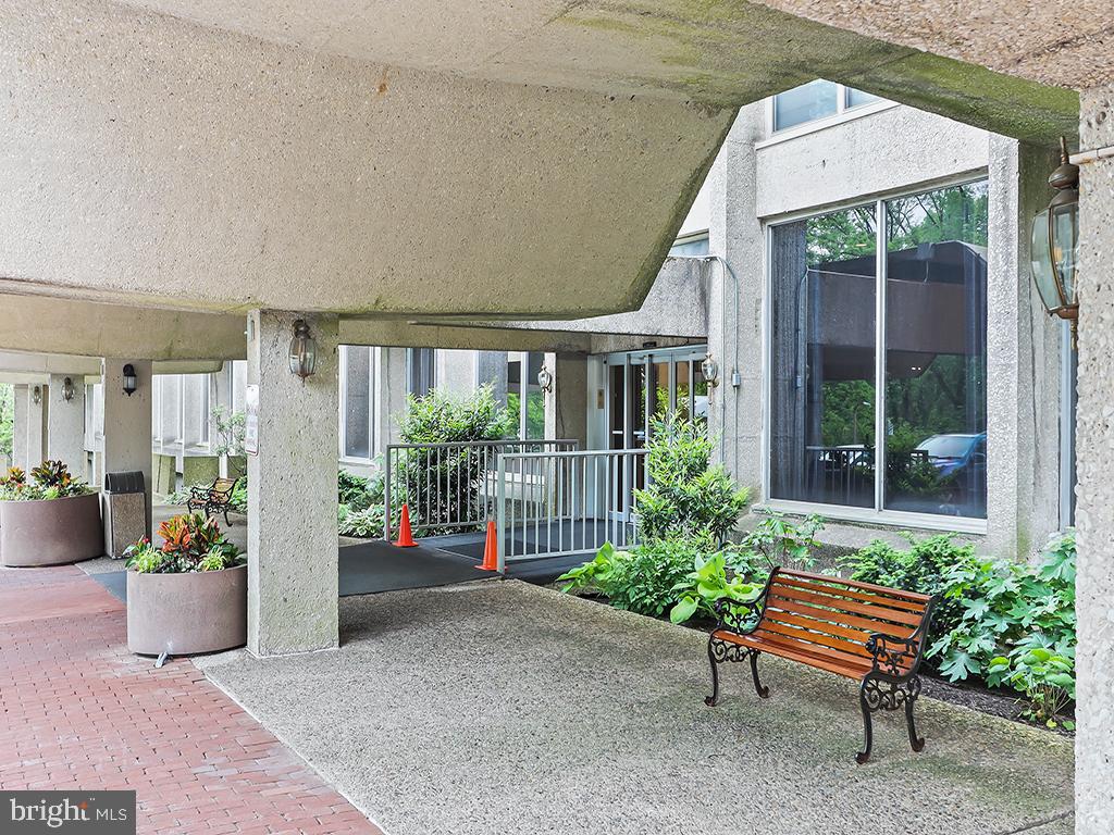 Welcome to the coveted Green Hill community on 23 acres of lush landscaped grounds on the Main Line. Prepare to find great value with this spacious 2 bedroom, 2 bathroom Penthouse condominium home poised for your personal touches and imagination. Embrace the warmth of natural light from the large windows in every room. This generously sized unit promises easy comfort and living with an eat in kitchen, opening up to a significantly sized living room. Through the large sliding door, enjoy the fresh air and park like setting year round on your private balcony off the dining/breakfast area. The 2nd bedroom has been opened up to the dining area to serve as a den/office, or guest room and can easily be converted back to an enclosed bedroom to serve your vision. Enjoy the convenience of in unit washer and dryer. Discover an abundance of storage throughout. This best value on the Main Line also includes all utilities built into the condo fee (except cable and internet). Make it your own. It's the perfect canvas for your imagination and design ideas for your next home. Step right into Penthouse living at the top of the Green Hill. Award winning Lower Merion School District. Quick drive to Center City, the City Ave. corridor and all places Main Line. Wonderful seasonal Community Pool (fee) . Indoor Pool and Health Club (fee) available in the West Building. Tennis and Pickle Ball easy to play on the 2 courts. Modern Playground for the children. Community Garden plot established in 2023 for a small seasonal garden plot fee. 24/7 Secured Front Gate and Doormen. This unit has had it's electrical panel upgraded to meet Township standards.