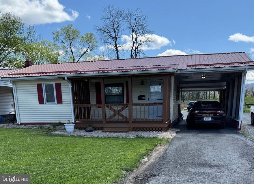2 Bedroom 1.5 BA house conveniently located in the Town of Moorefield.  Recently renovated.  Brand new bathrooms, new hot water heater, new gas range, new metal roof.  Additional perks include a Front porch and attached carport.  Also includes a Bay garage with electric and an outbuilding with electric. Need to schedule an appointment.  Get rid of that rental and make this one your own.