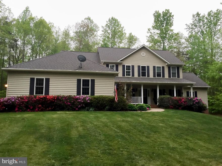 BEAUTIFUL LARGE 3 LEVEL COLONIAL ON 3.02 PRIVATE ACRES!  AWESOME VERSATILE OPEN FLOOR PLAN WITH 2 MASTER BEDROOMS & BATHS! LARGE BEDROOMS, 2 FIREPLACES, WOOD FLOORS, GOURMET KITCHEN WITH GRANITE TOPS, LARGE WALK OUT BASEMENT, 2 STORY FAMILY ROOM, LARGE MUD ROOM / LAUNDRY, 3 CAR GARAGE!, HUGE DECK WITH STAMPED CONCRETE WALK, OVERSIZED FRONT PORCH, AND MUCH MORE!  GREAT NON HOA NEIGHBORHOOD!  A++